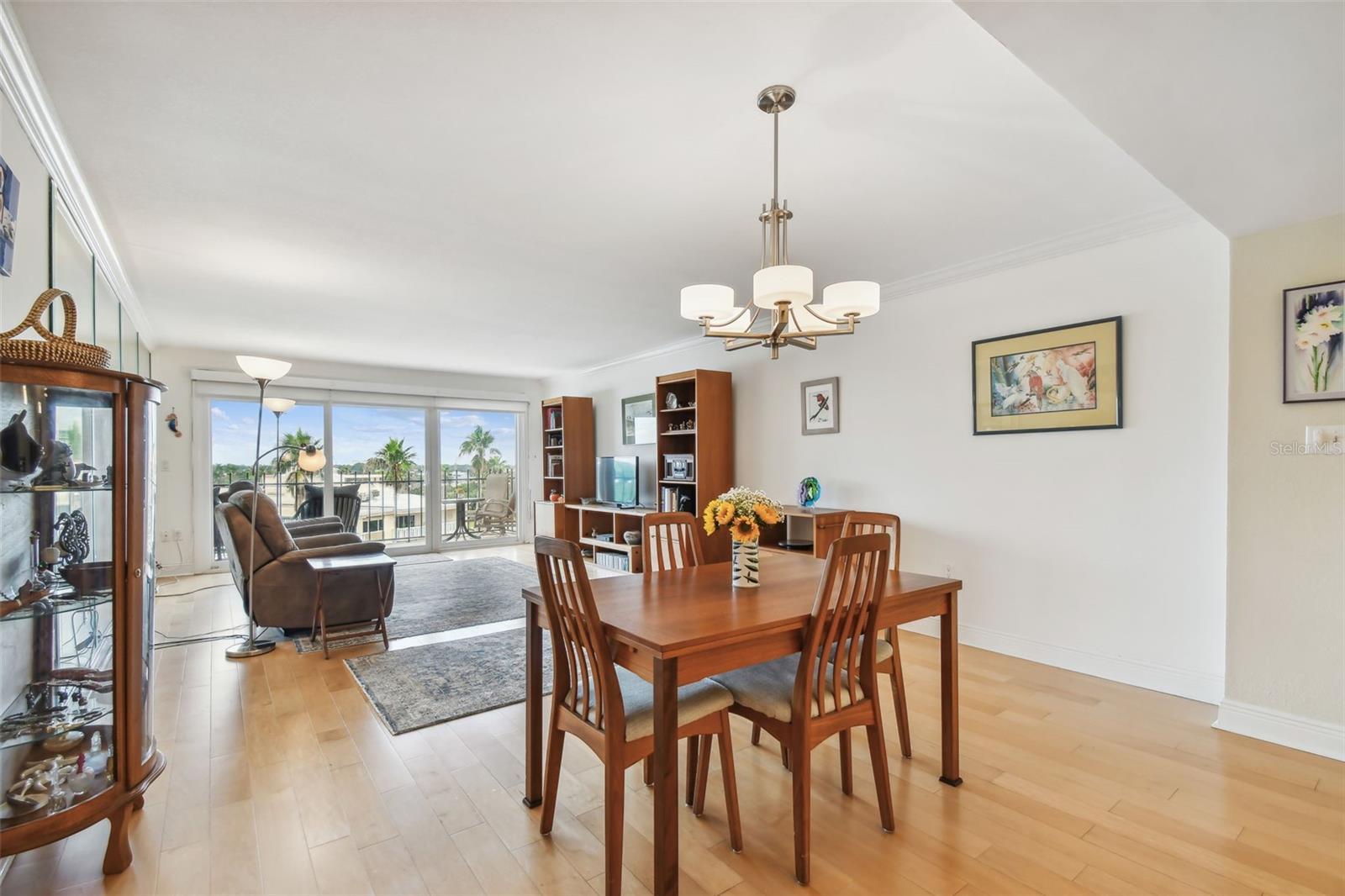 Open floor plan with engineered hardwood flooring.