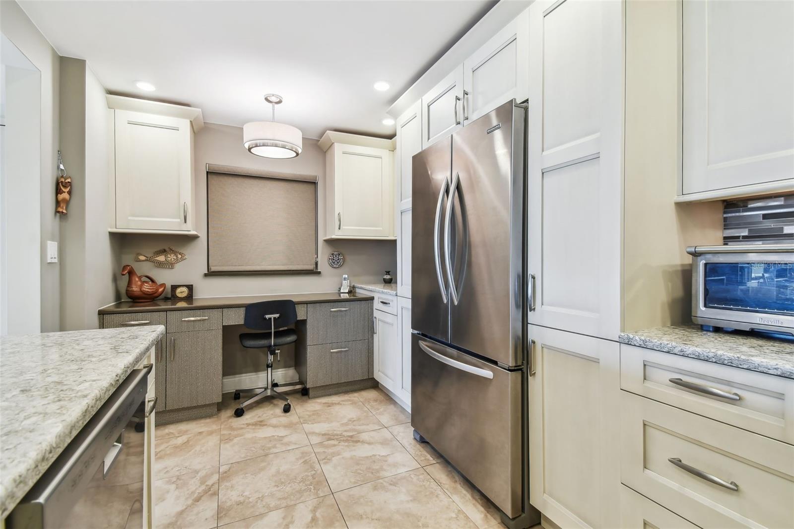 Kitchen with build in desk