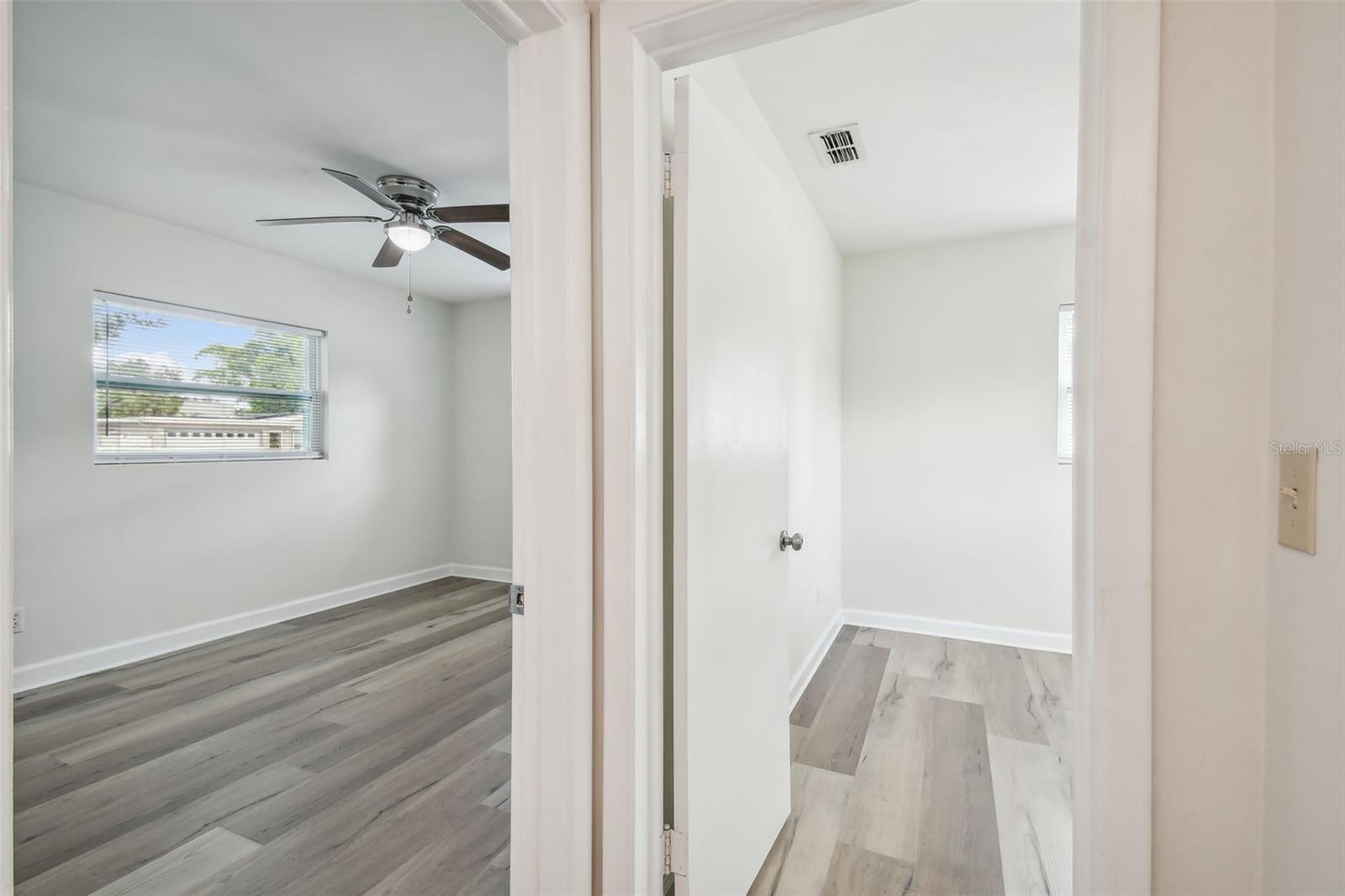 Entrance to Master Bedroom on left and to Second Bedroom on right