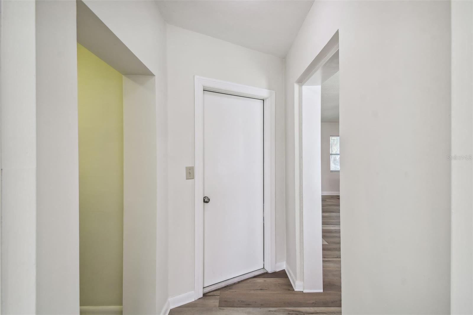 Hallway to Garage, Laundry Room & Den