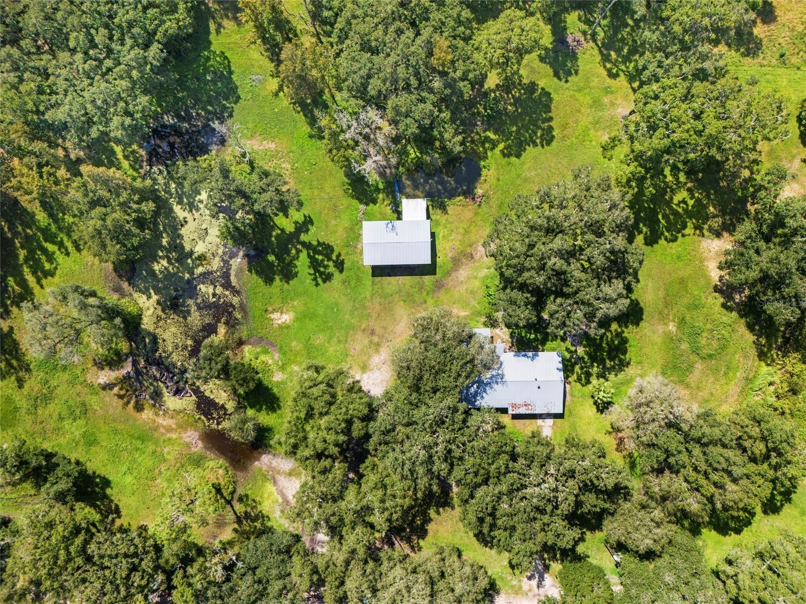 Aerial view of house and land