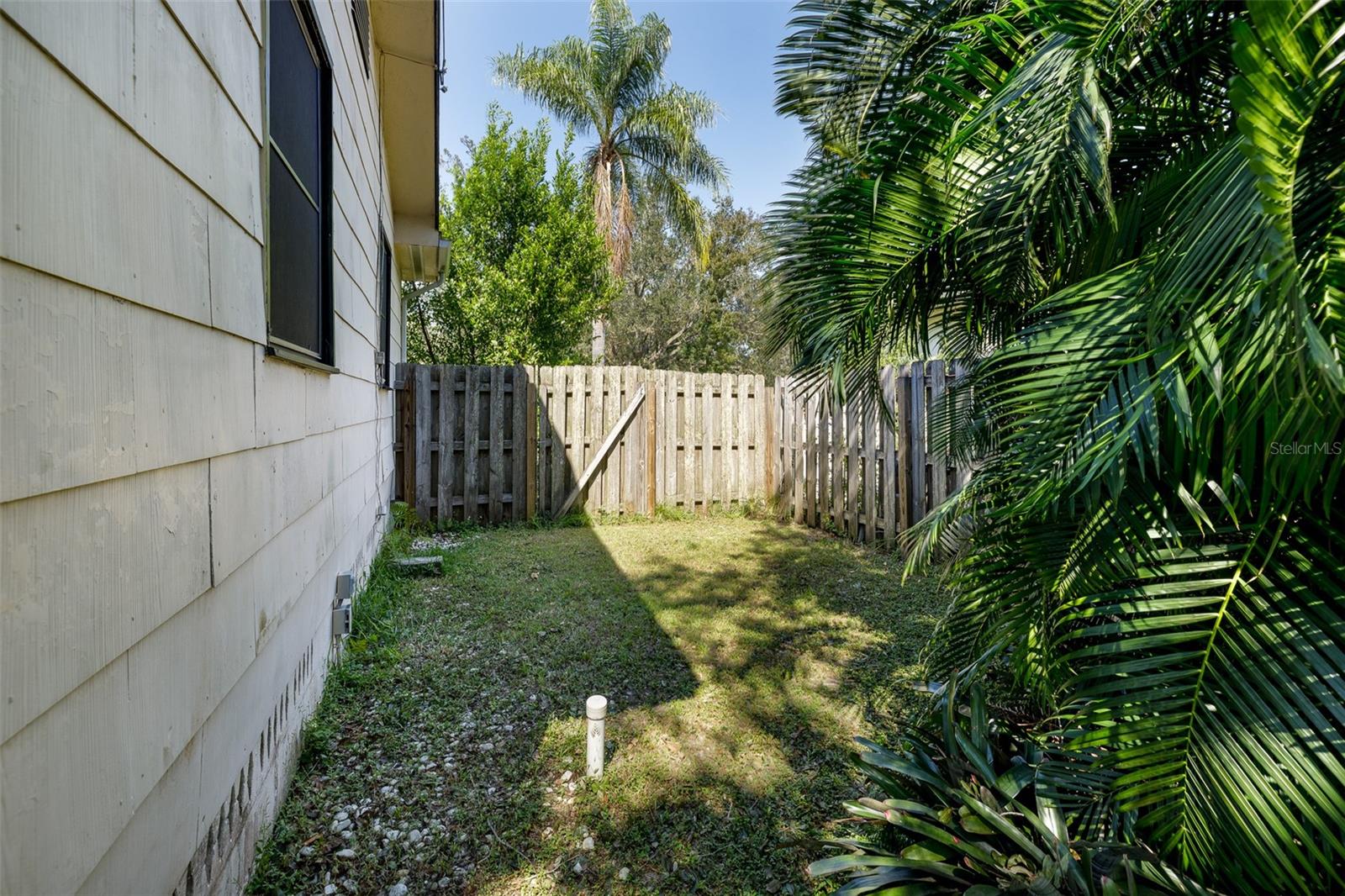 side yard with gate to front