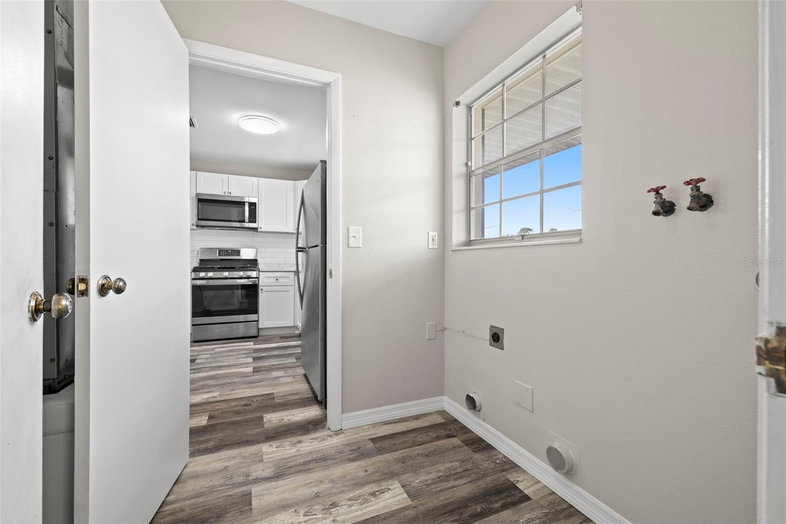 Inside Utility Room with Gas Water Heater