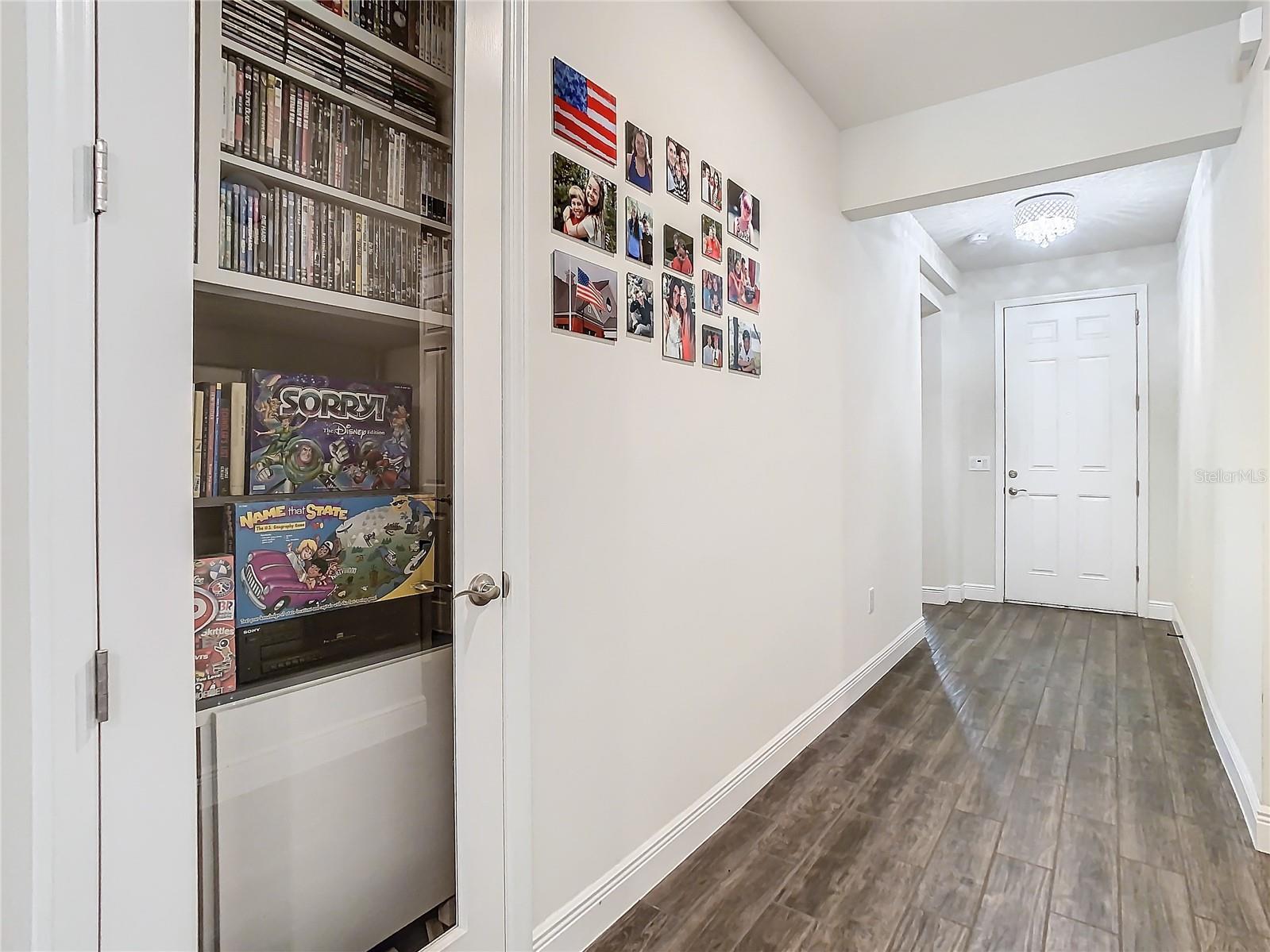 Front Door Entryway with wood look porcelain tile floors.