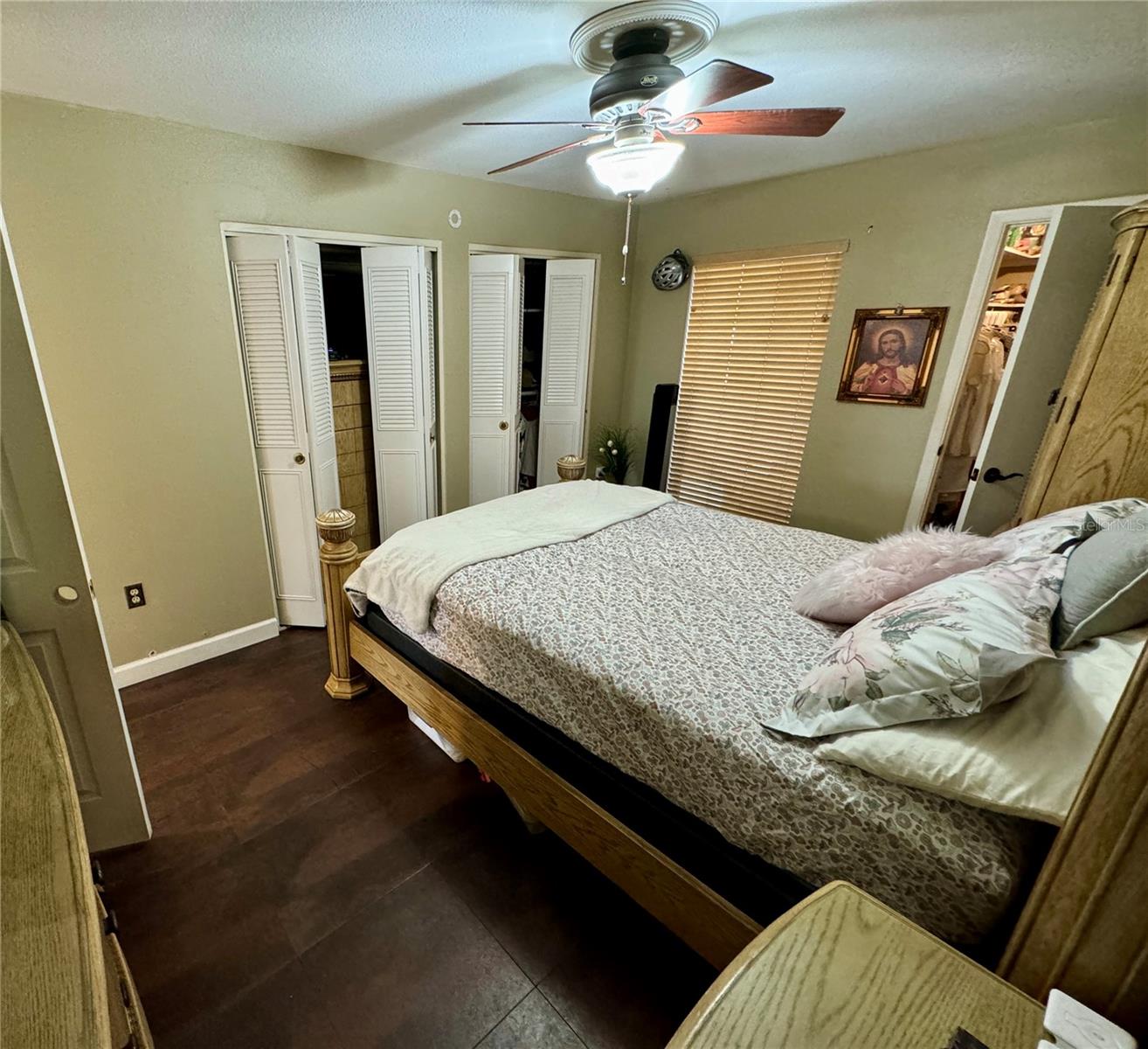 Bedroom with full wall closets