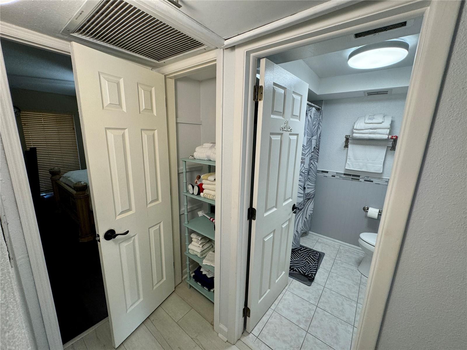 Linen closet right outside the bathroom