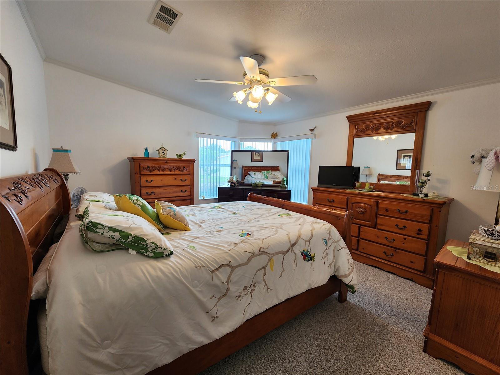 Guest bedroom with walk-in closet.