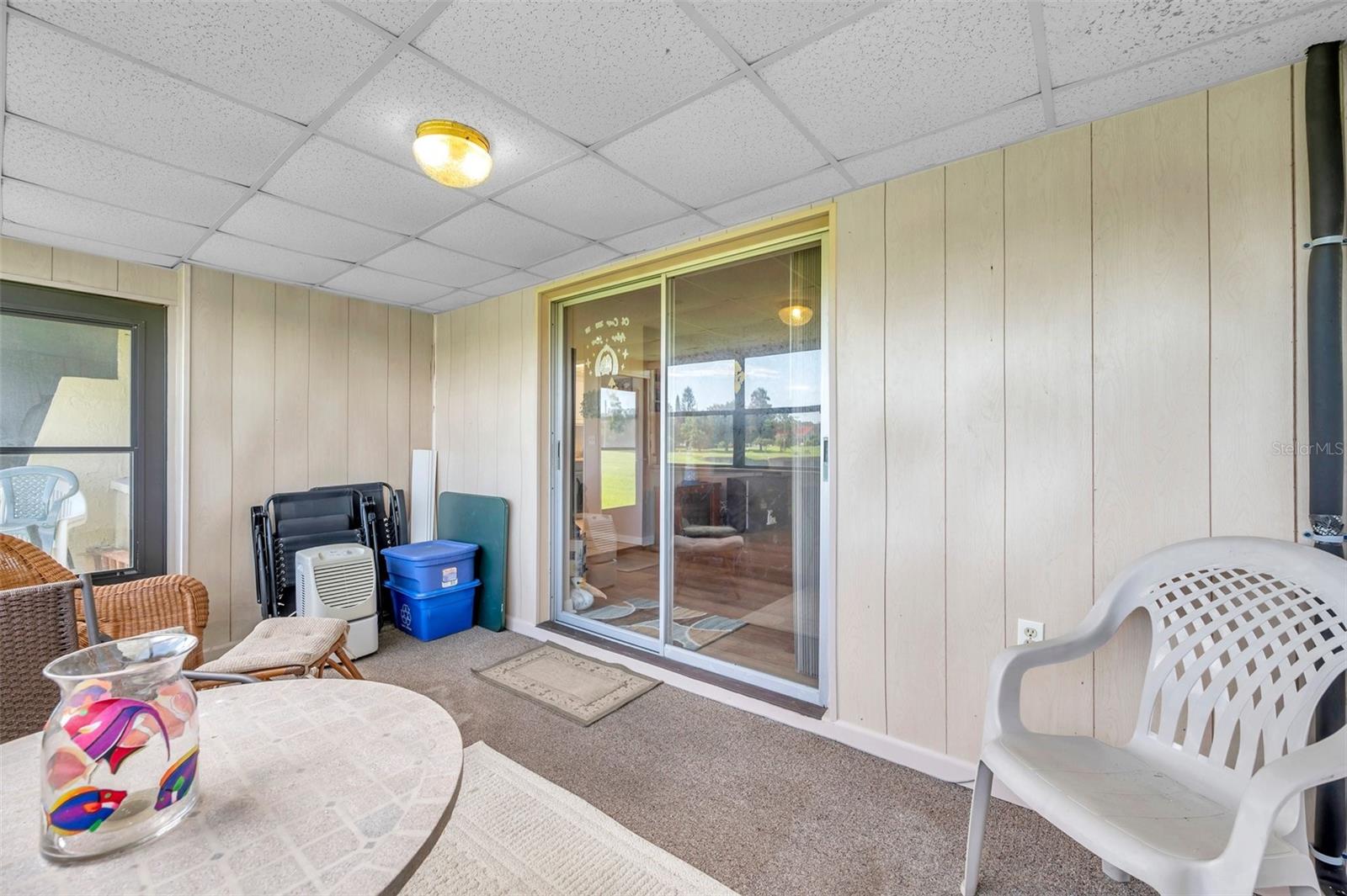 Sliding glass doors from livingroom to Enclosed porch