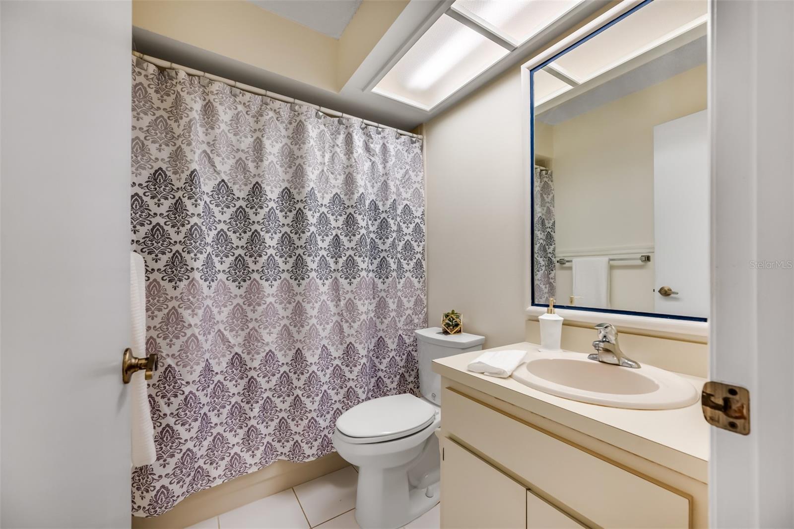 Second or guest bathroom has tub/shower combination