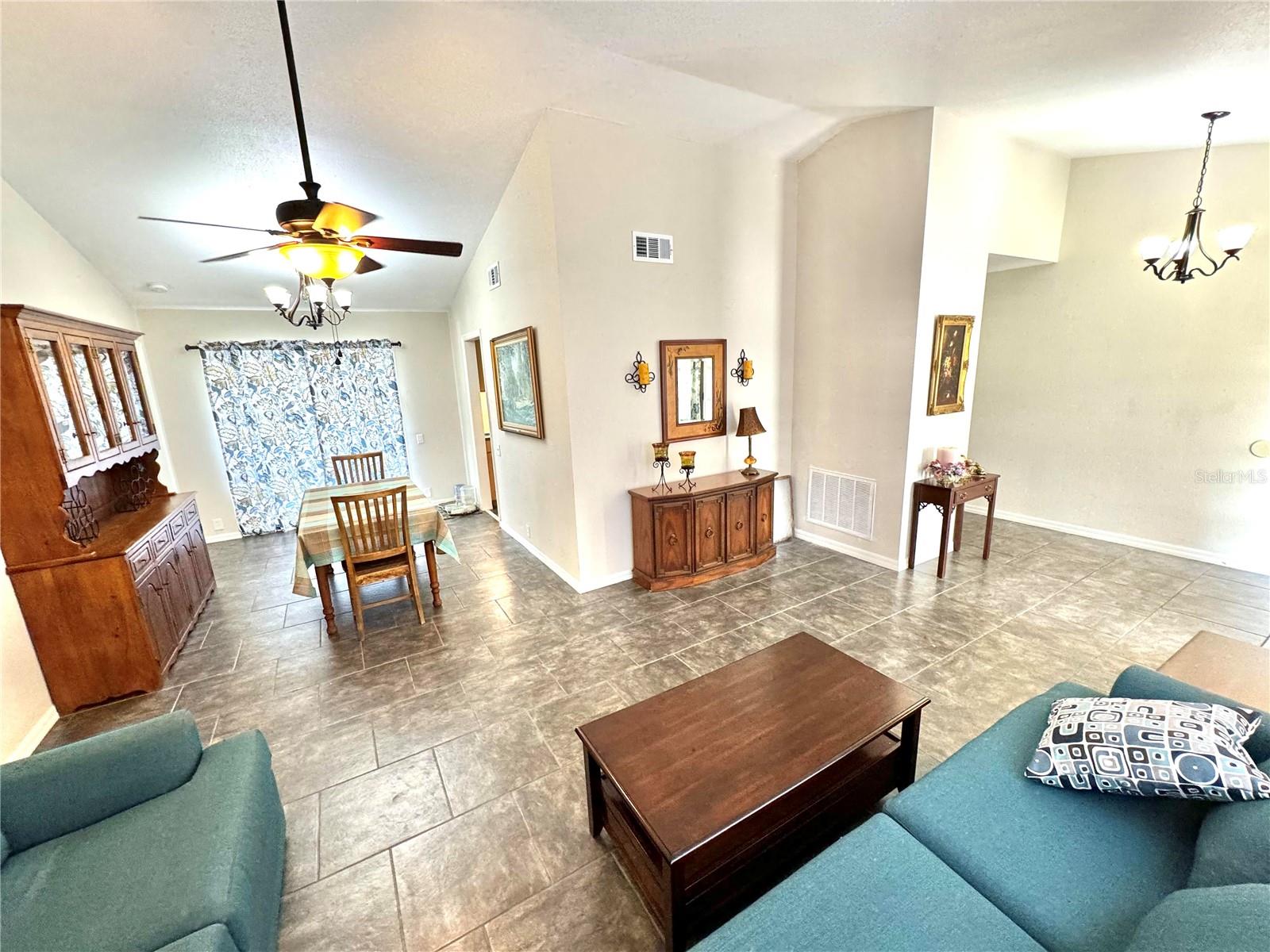 Formal dining area adjacent to living room