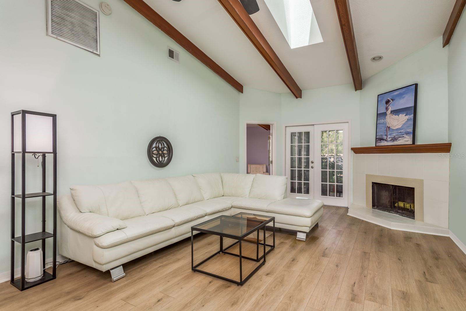 Spacious Living Room with Vaulted Ceilings