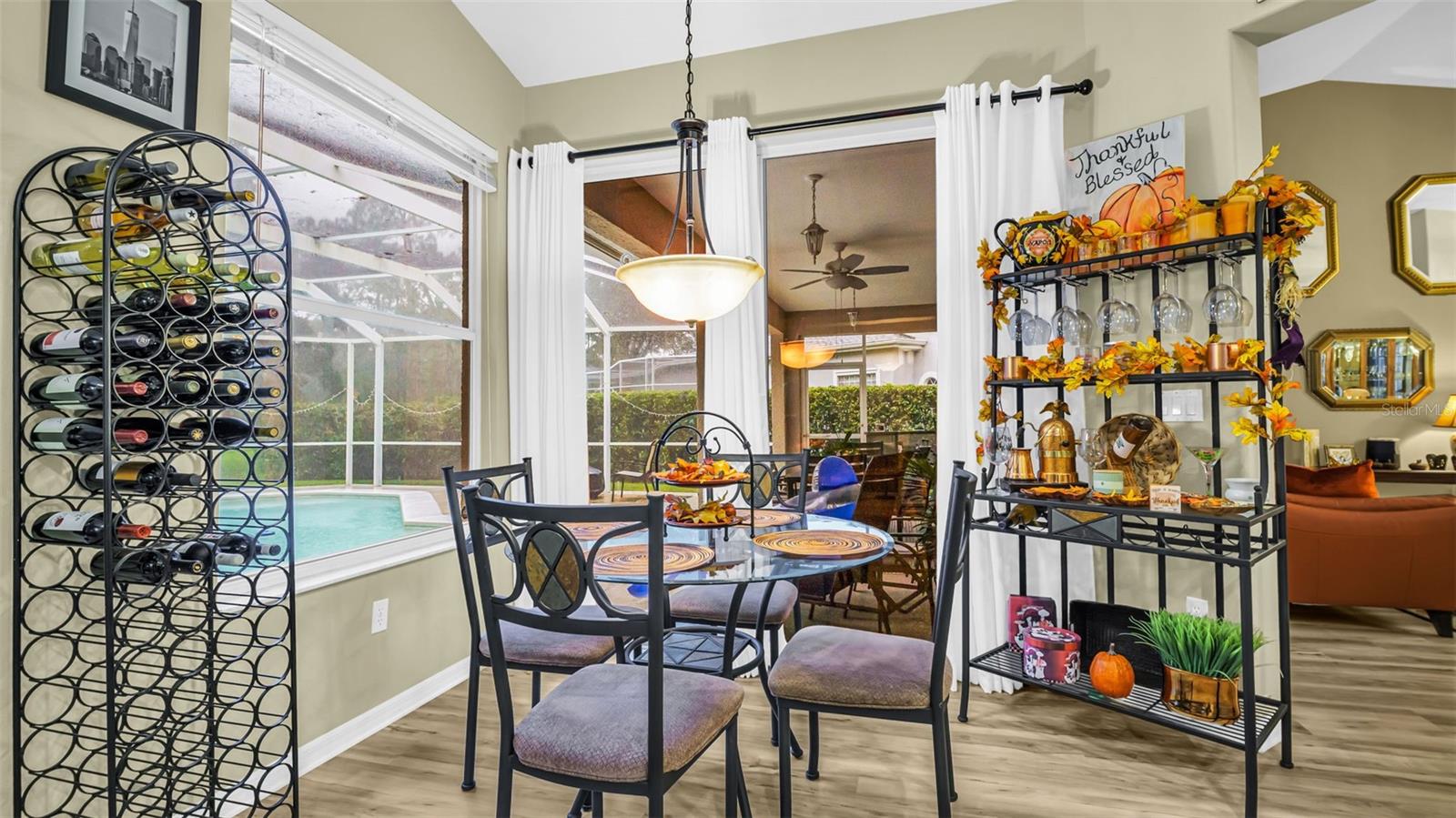 Eat-In Kitchen Area with Sliding Doors which Lead to Pool