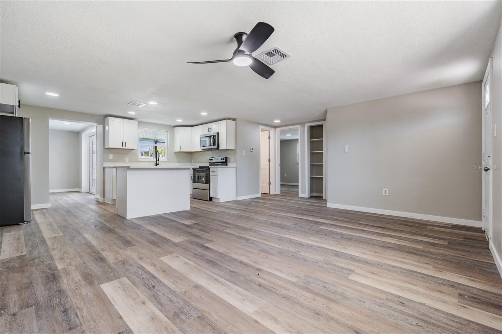 New countertops! New Appliances! New Cabinets with pulls! New Flooring! New Inset Lights! New Ceiling Fan!