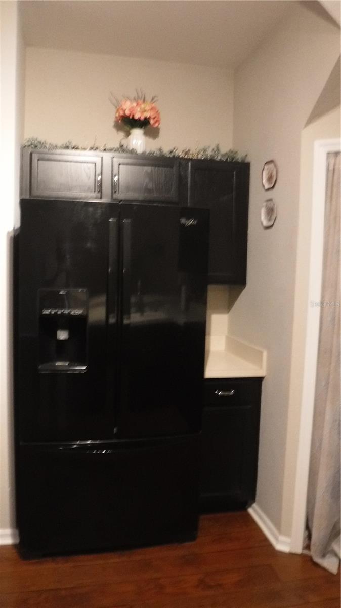 Refrigerator next to pantry