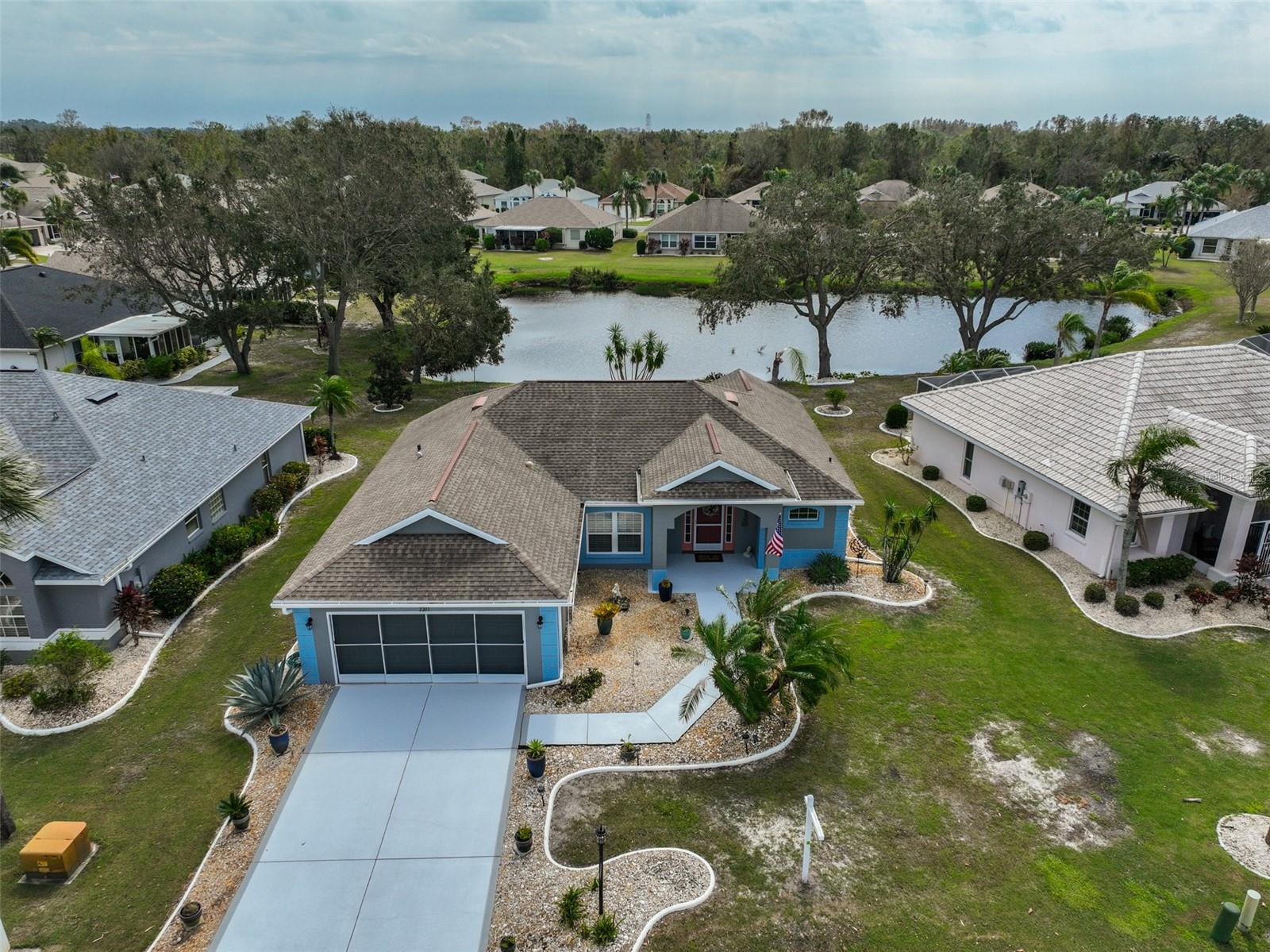 "Floridian Feel' home view a stunning pond view.