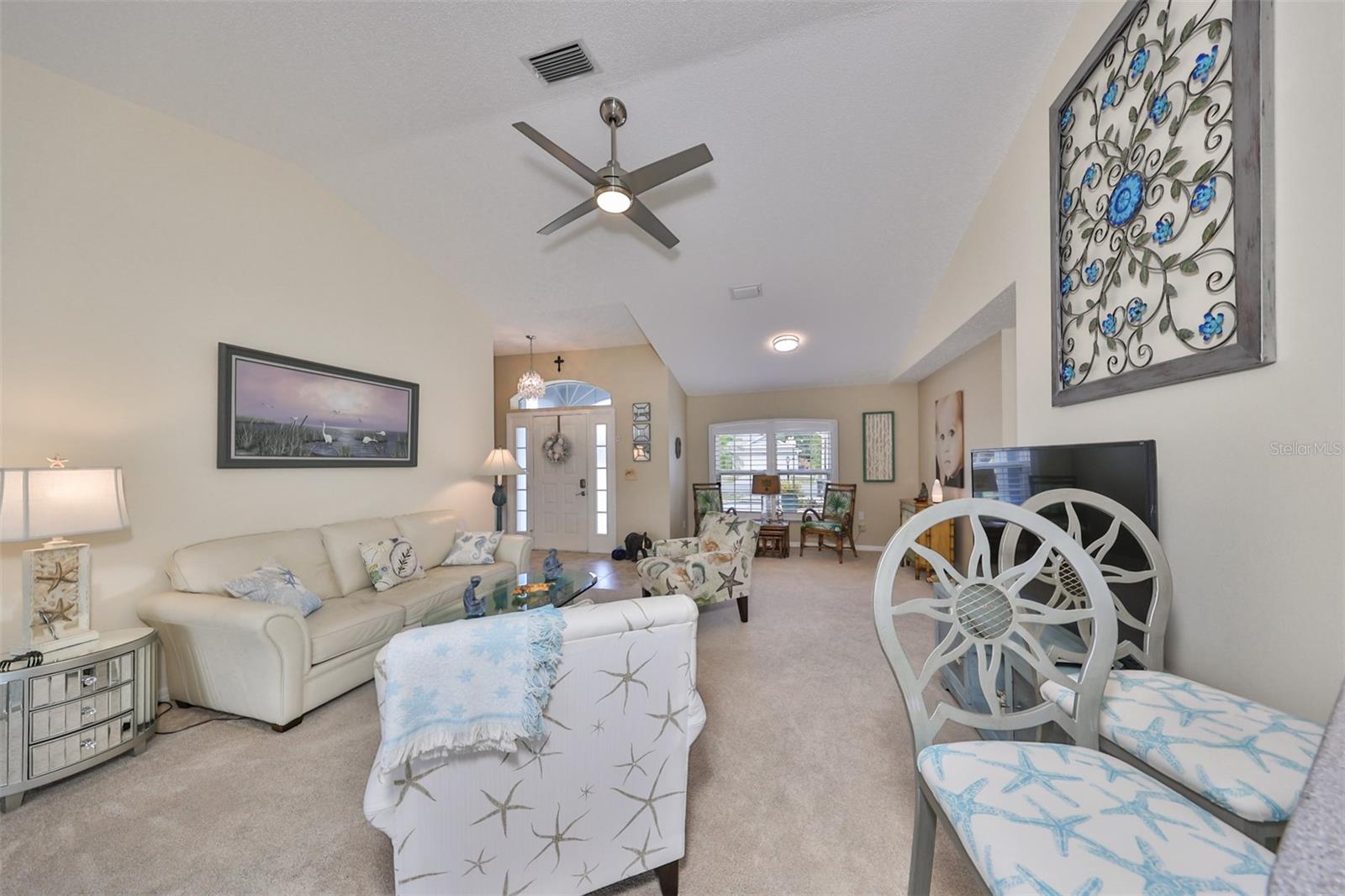 Lots of space for entertaining and enjoying life.  The dining room is in the far back of the picture.