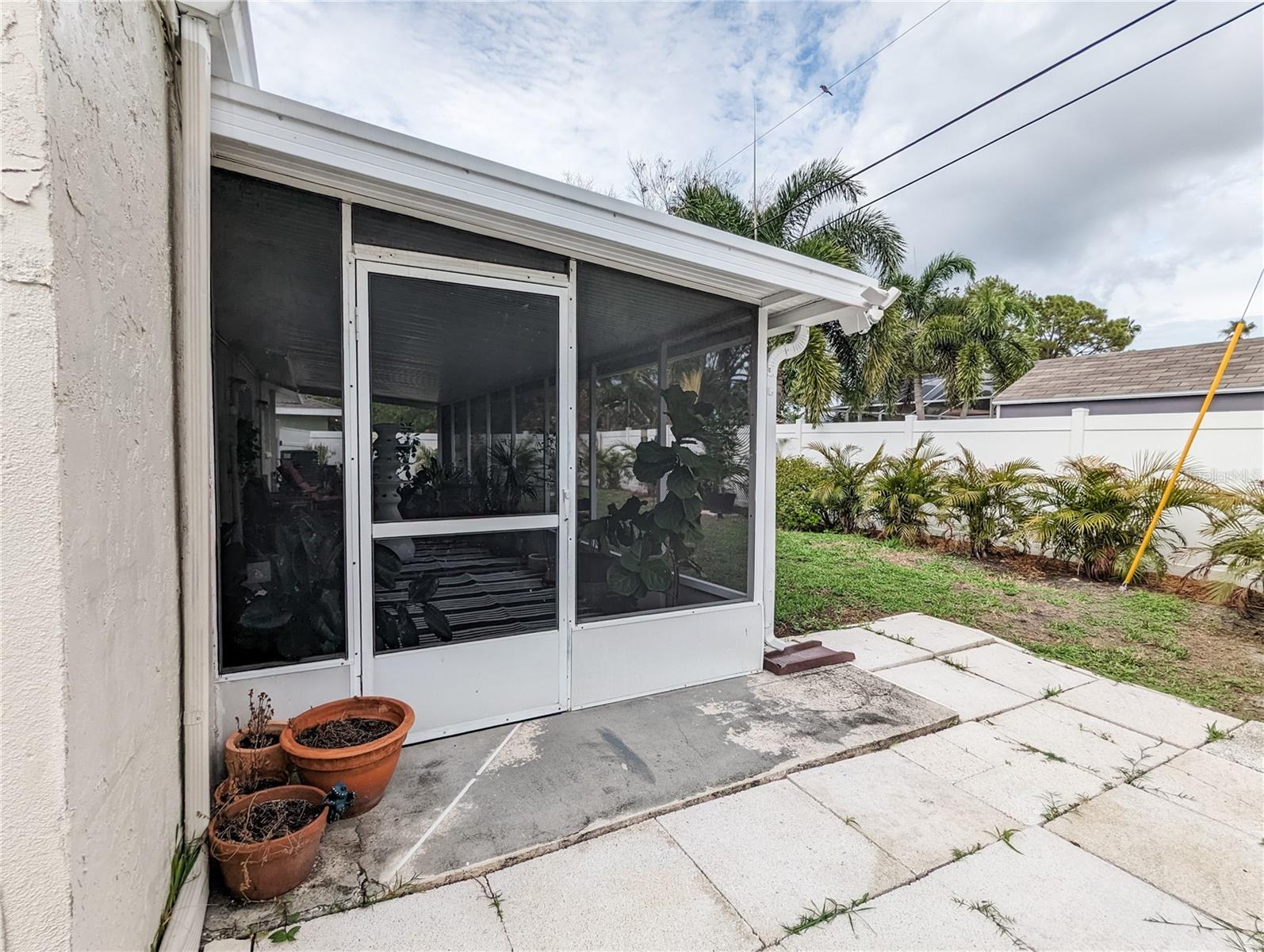 Photos are from Pre-Hurricane Helene. Florida Room and Backyard.