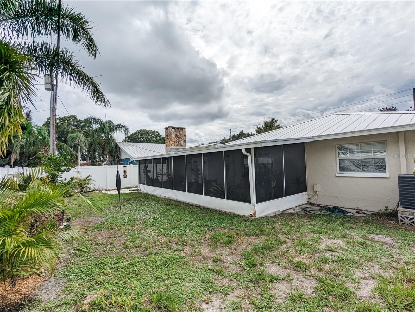 Photos are from Pre-Hurricane Helene. Florida Room and Backyard