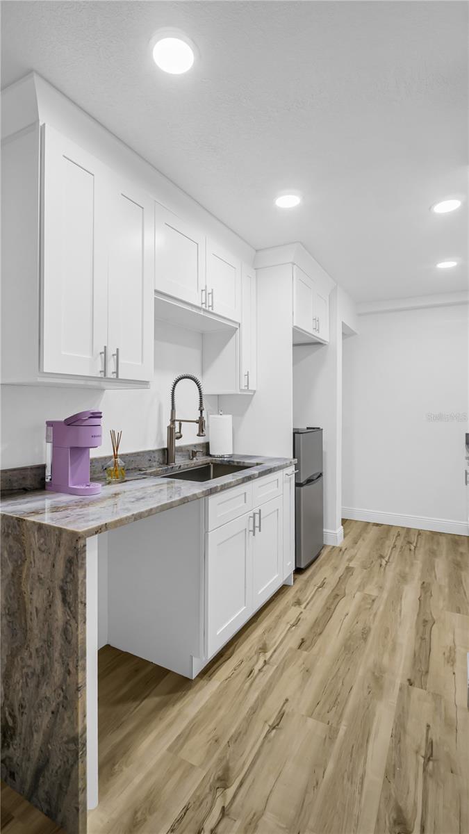 Kitchen with new granite countertops