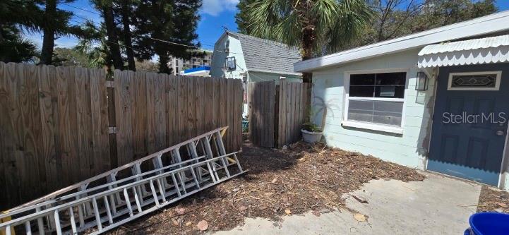 Front of House-Entrance to Shed/Fence Area