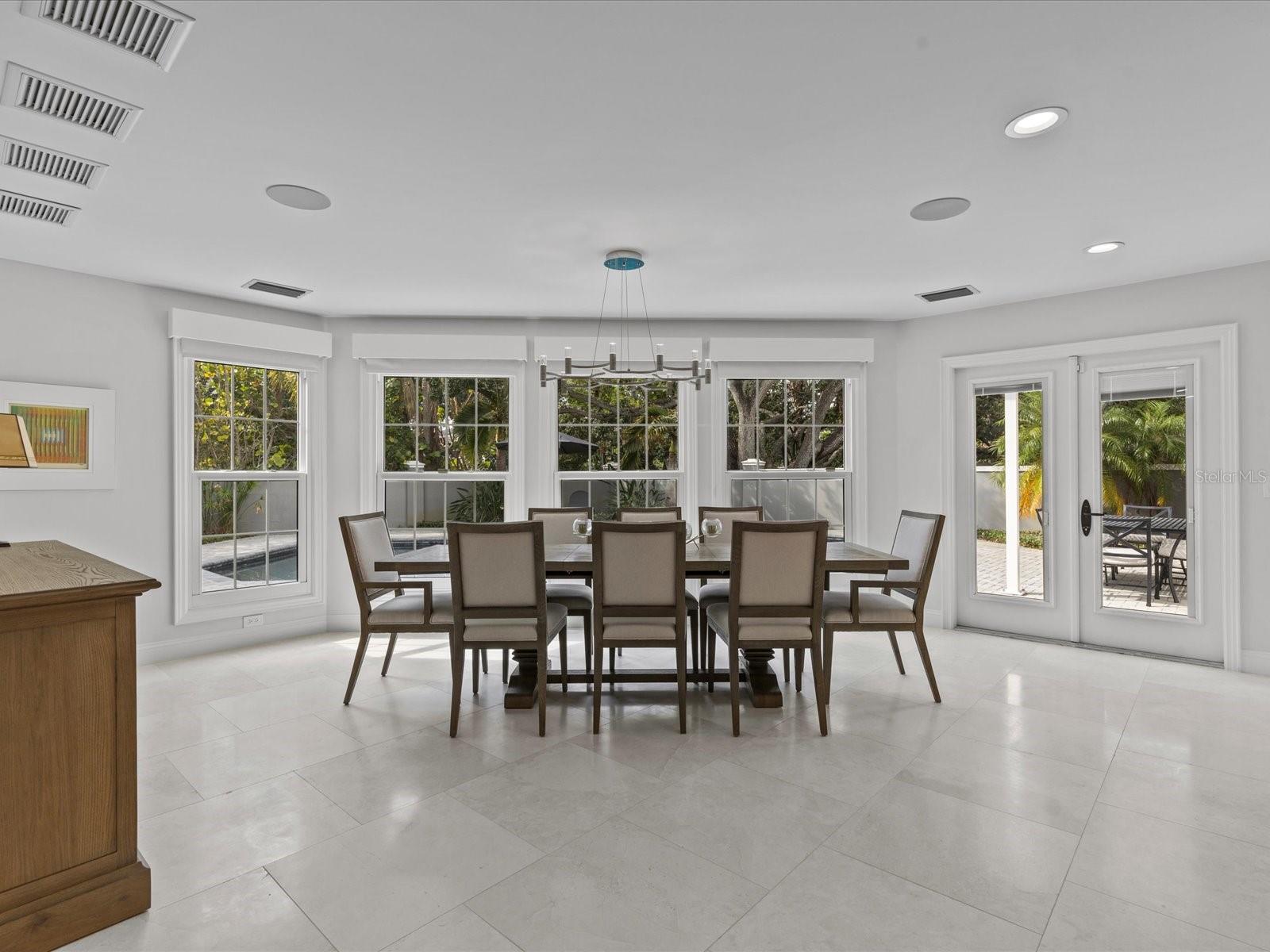 Formal dining with beautiful pool views