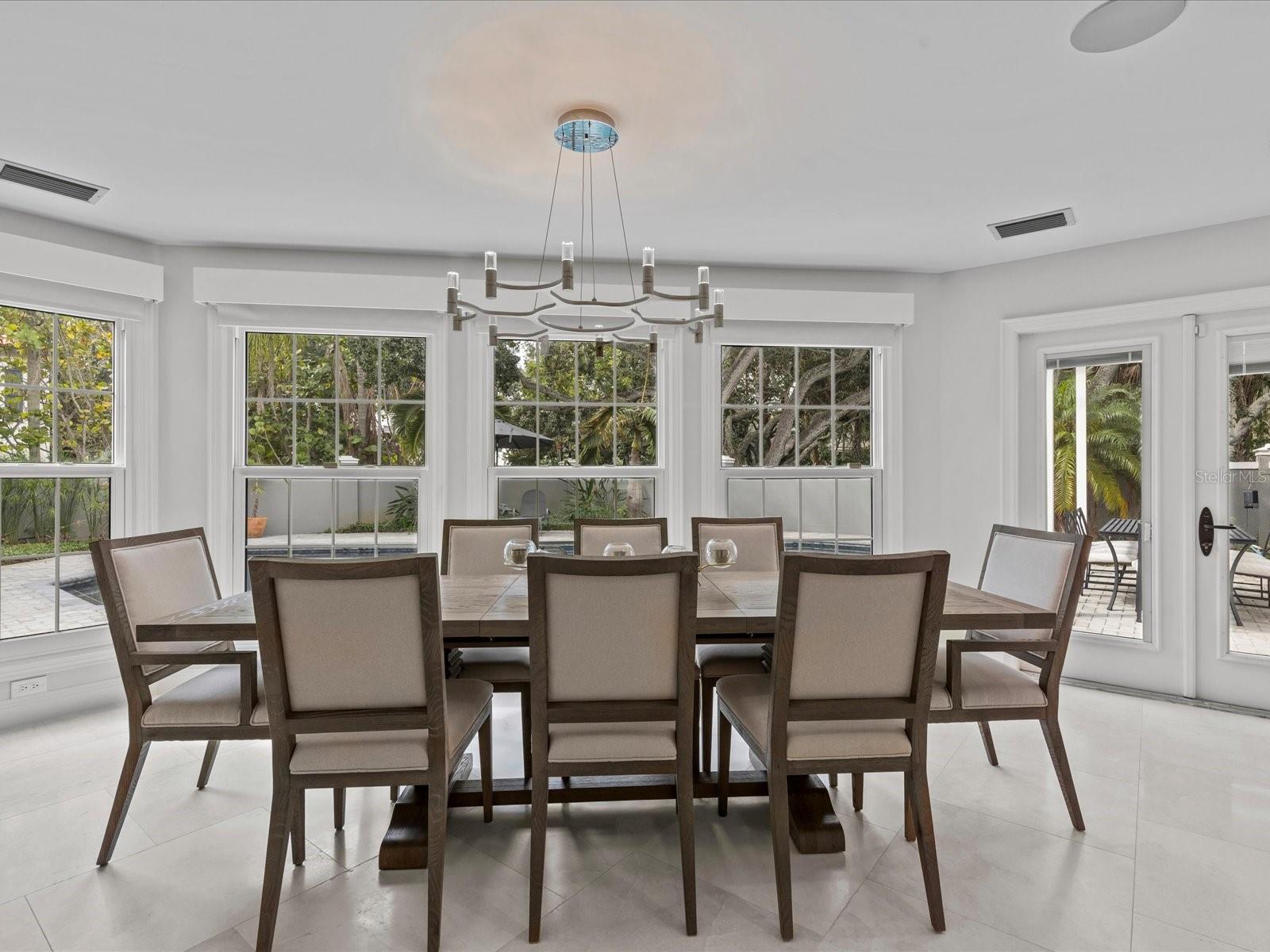 Formal dining with beautiful pool views