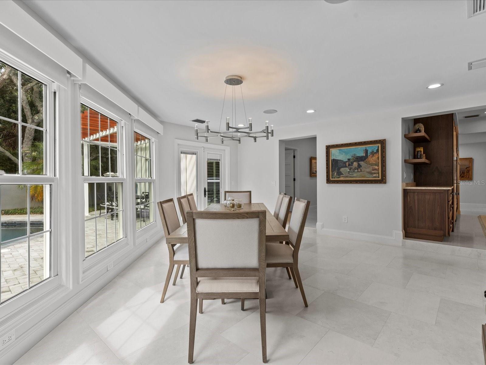 Formal dining with beautiful pool views