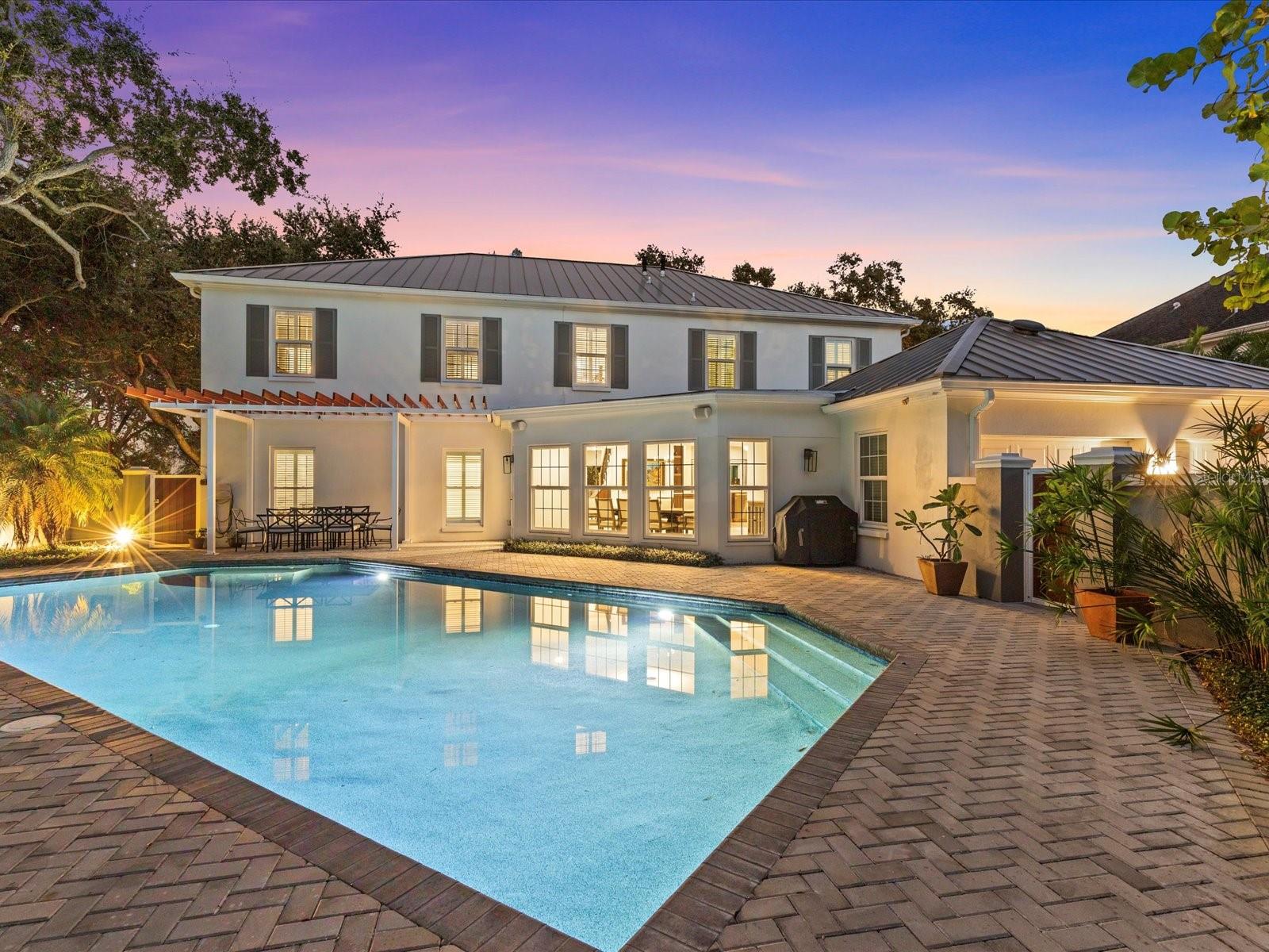 Oversized pool w/ private wall and dining area