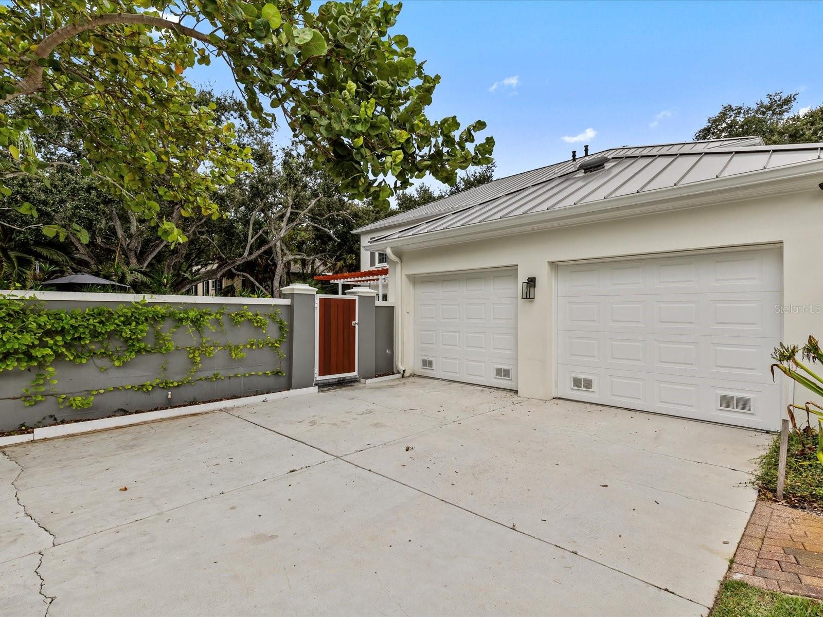 Rear entry garage + parking pads