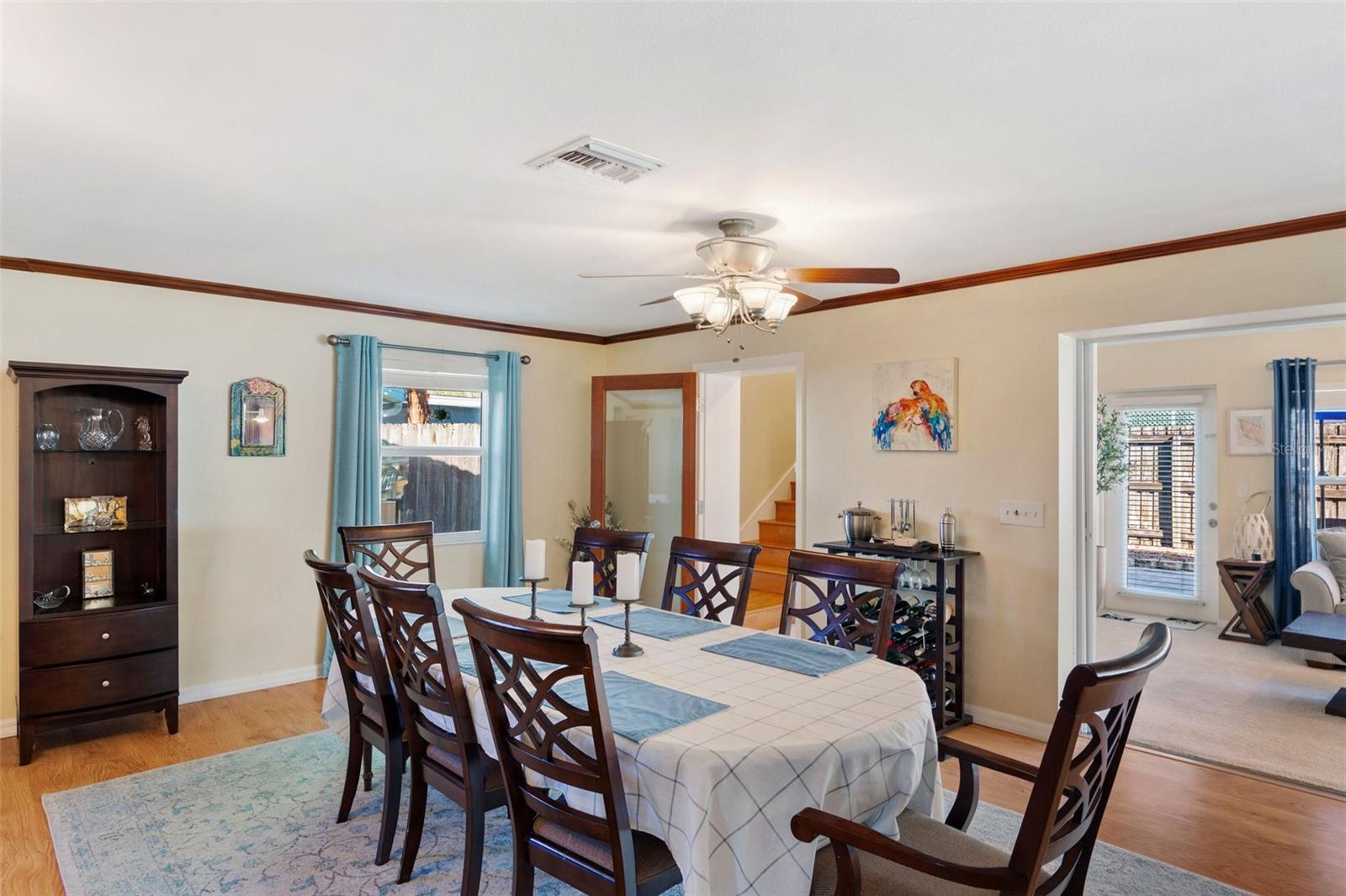 Dining Room, the door in the back leads upstairs, above the Florida Room, to a private owner's suite!