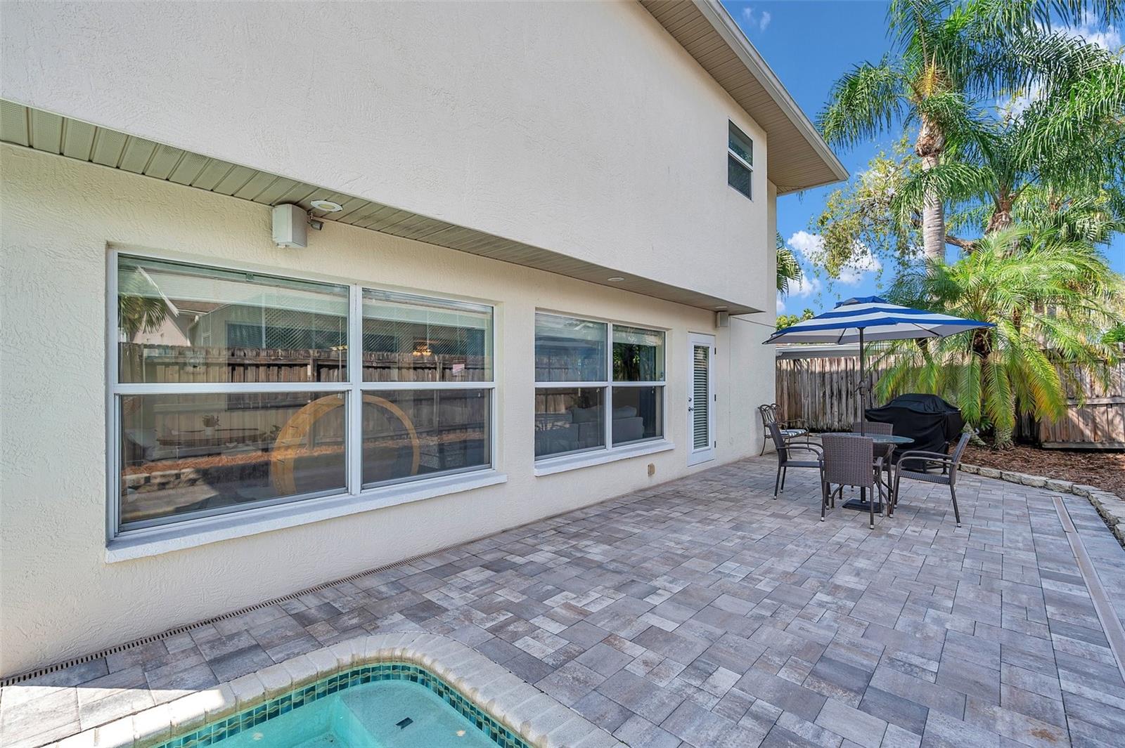 Florida Room overlooking Pool area with plenty of space to entertain!