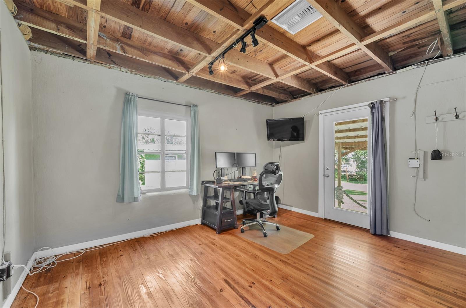 Bedroom with access to backyard deck