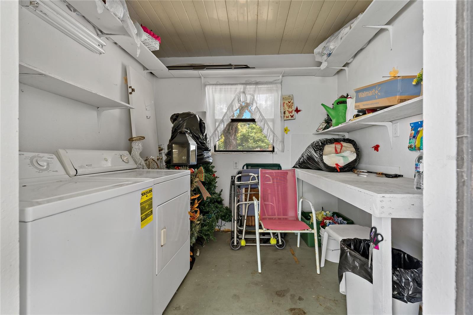 utility room with washer and dryer