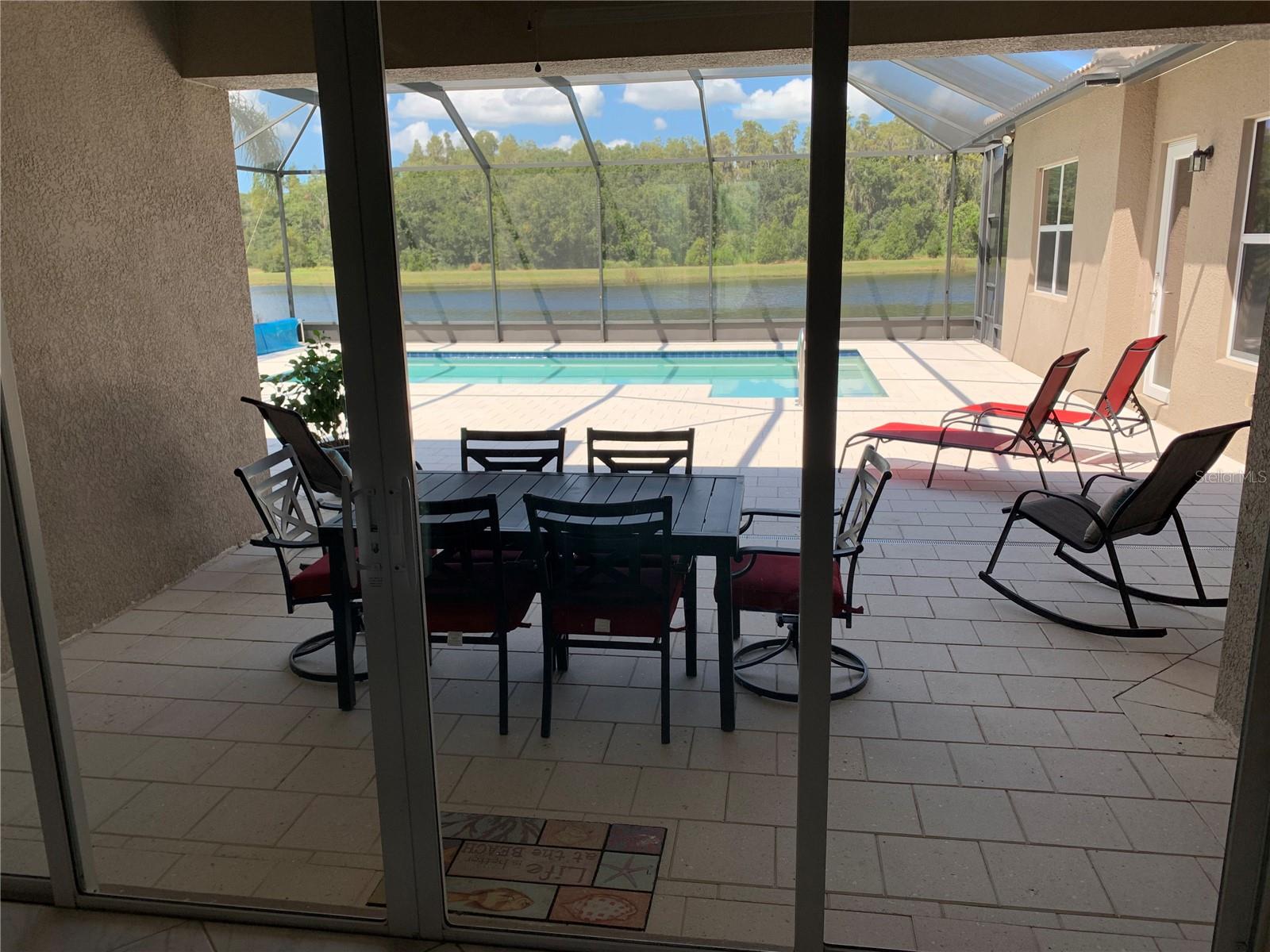 pool from living room, duo sliding doors