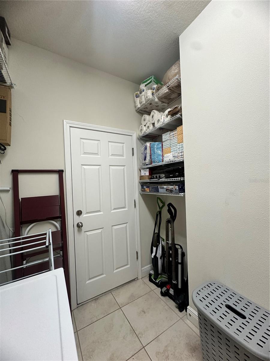 Inside Laundry room storage shelves