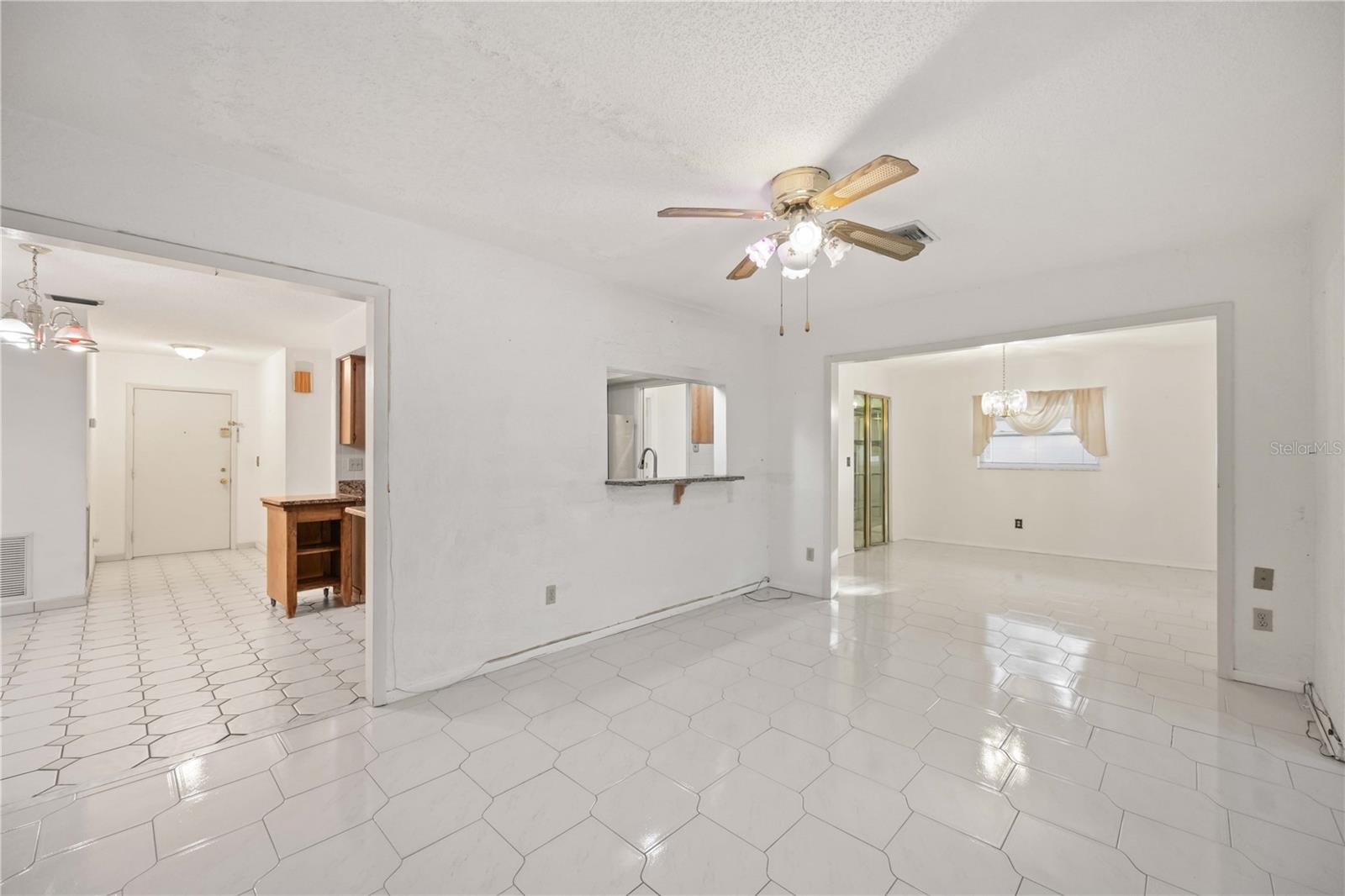 The kitchen, dining room, & the dinette area all overlook the living rooom.