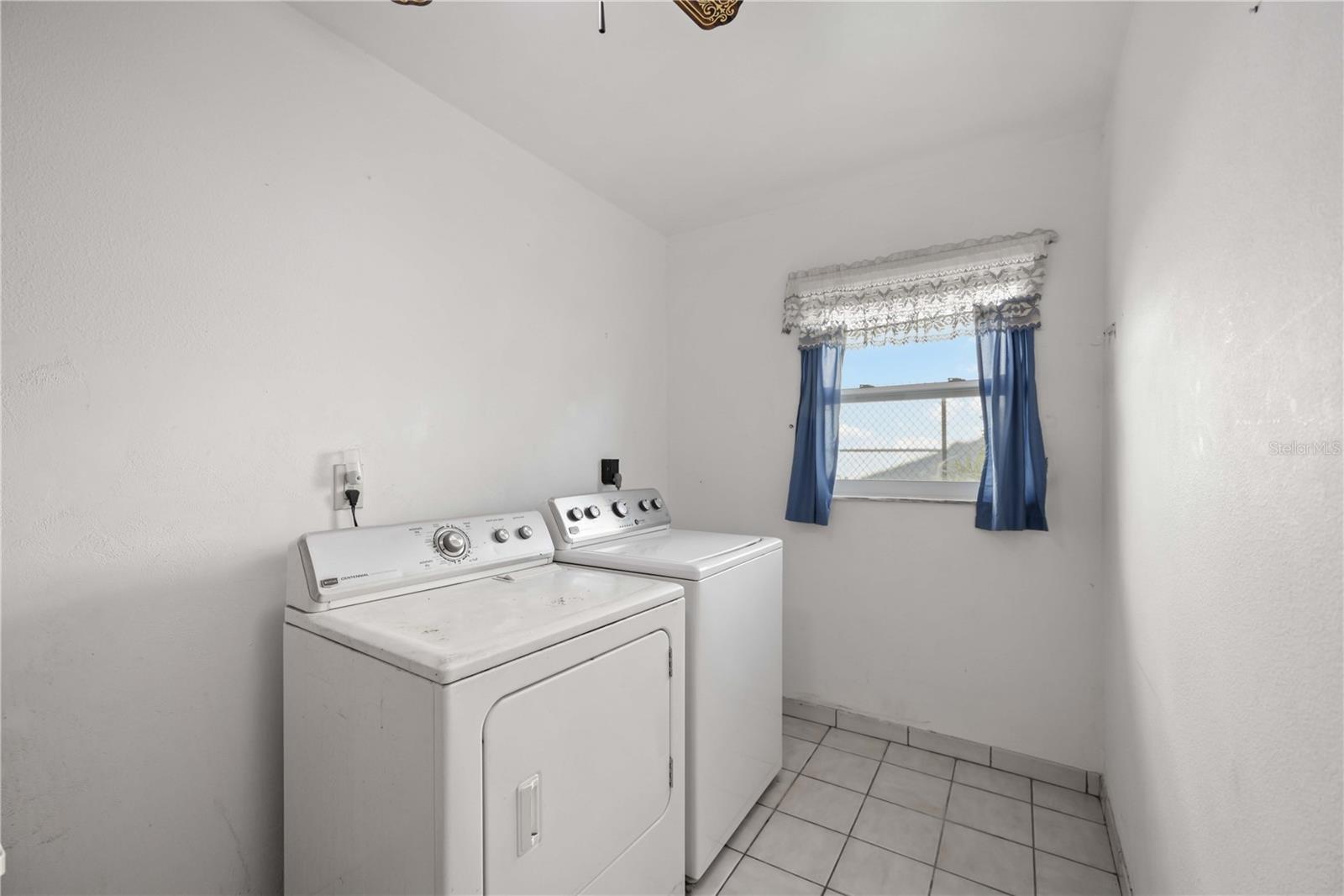 You will enjoy the inside laundry room off of the dinette area.