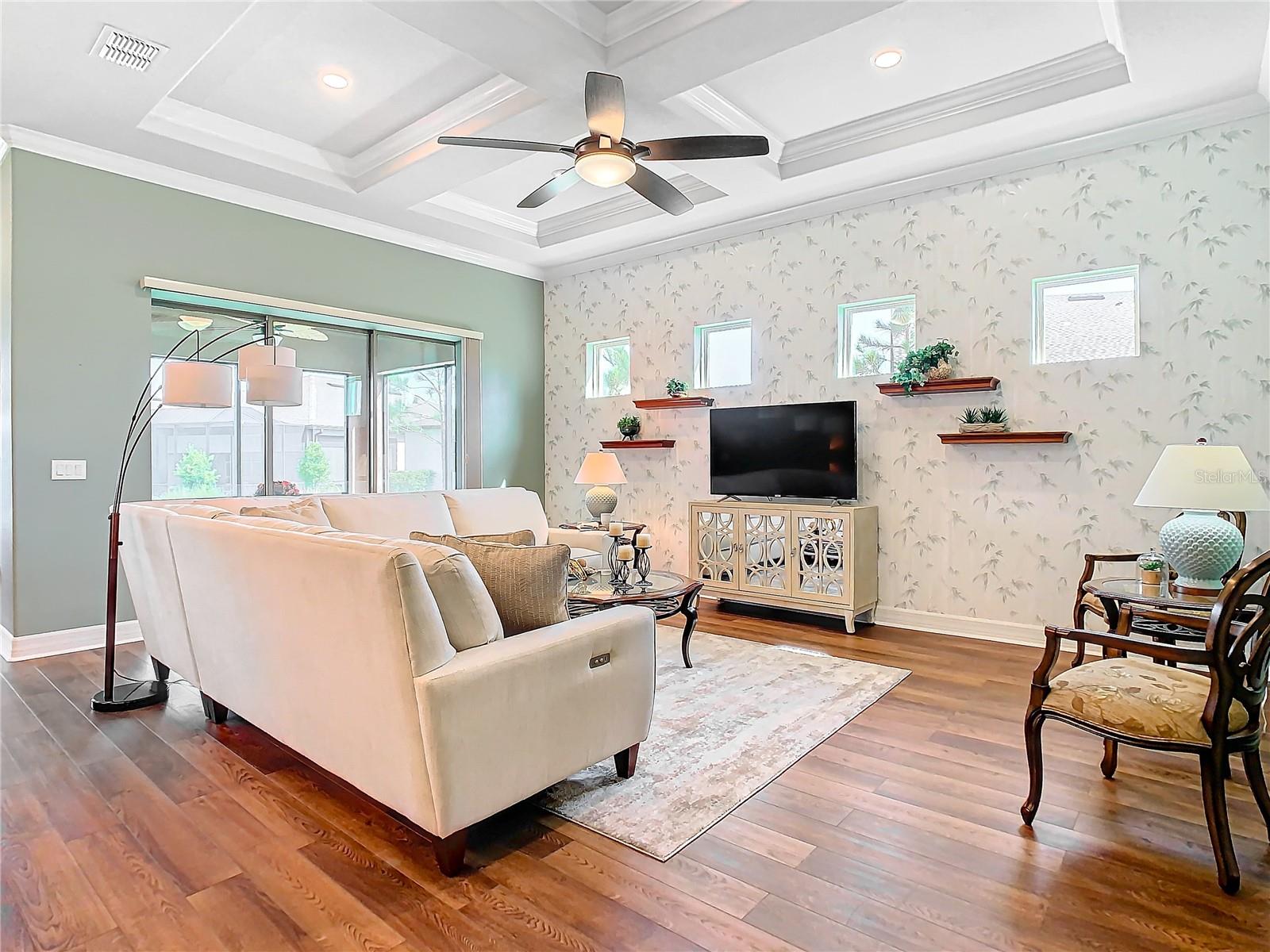 Notice the clerestory windows and the soaring coffered ceiling.