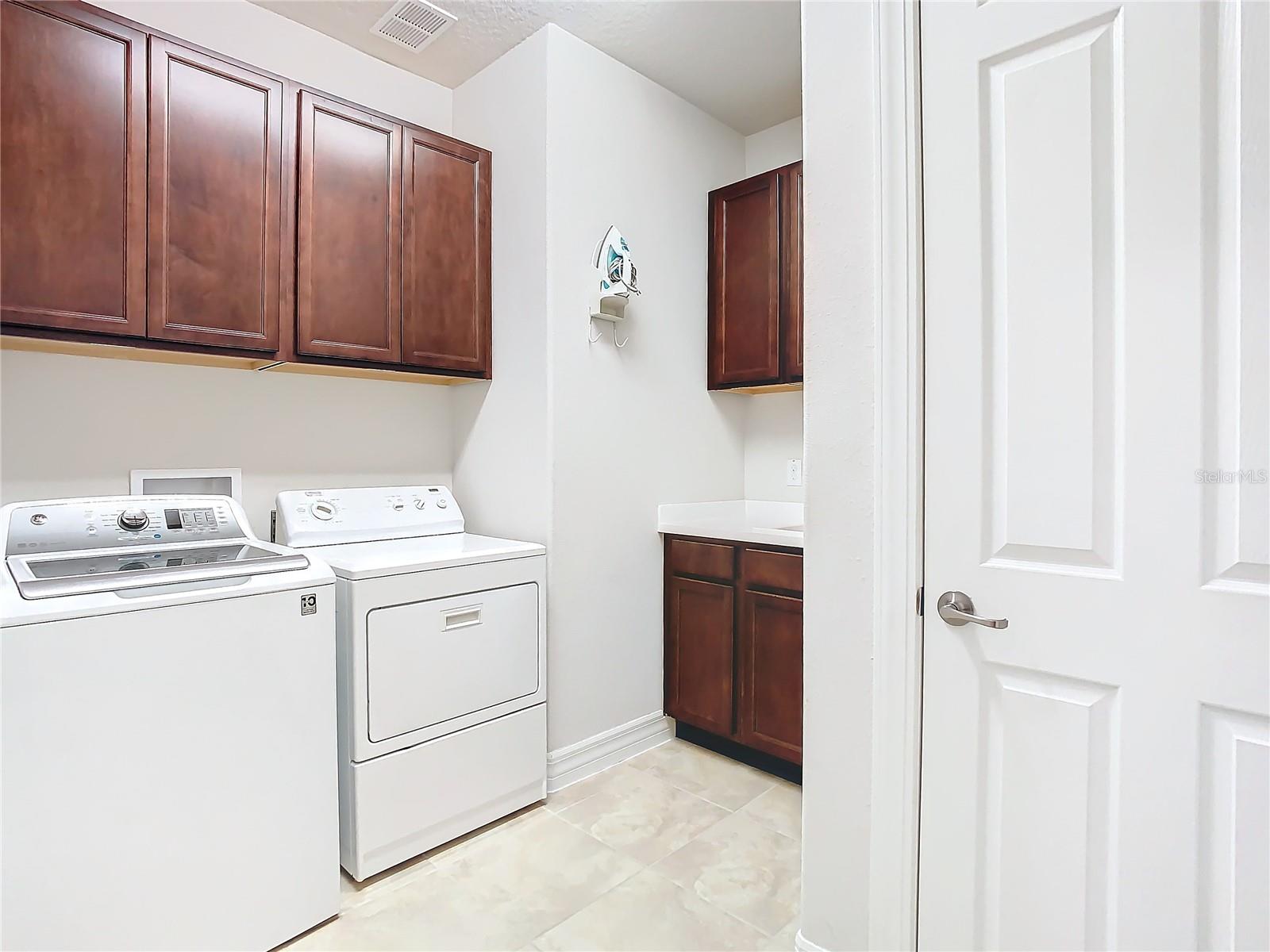 Utility room with extra storage..