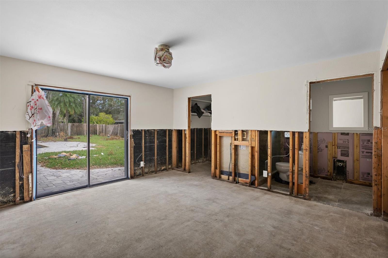 Primary Ensuite Bedroom with two reach-in closets and walk-in closet