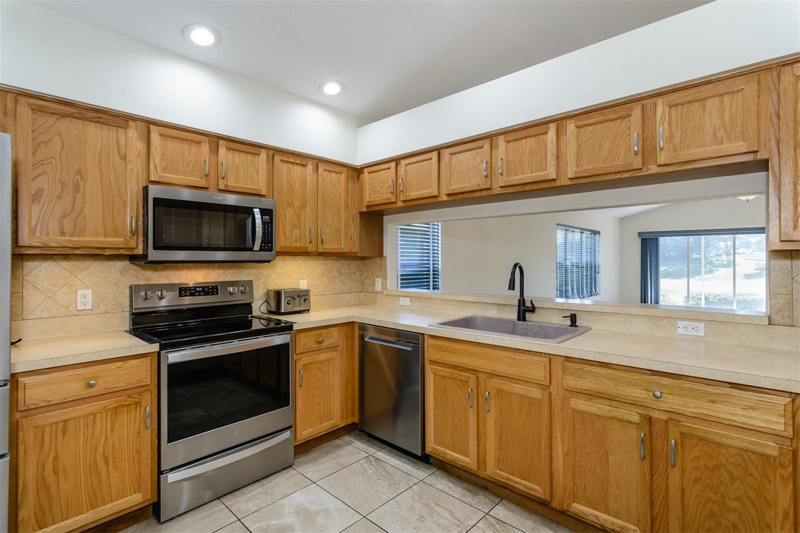 WOOD CABINETS IN KITCHEN