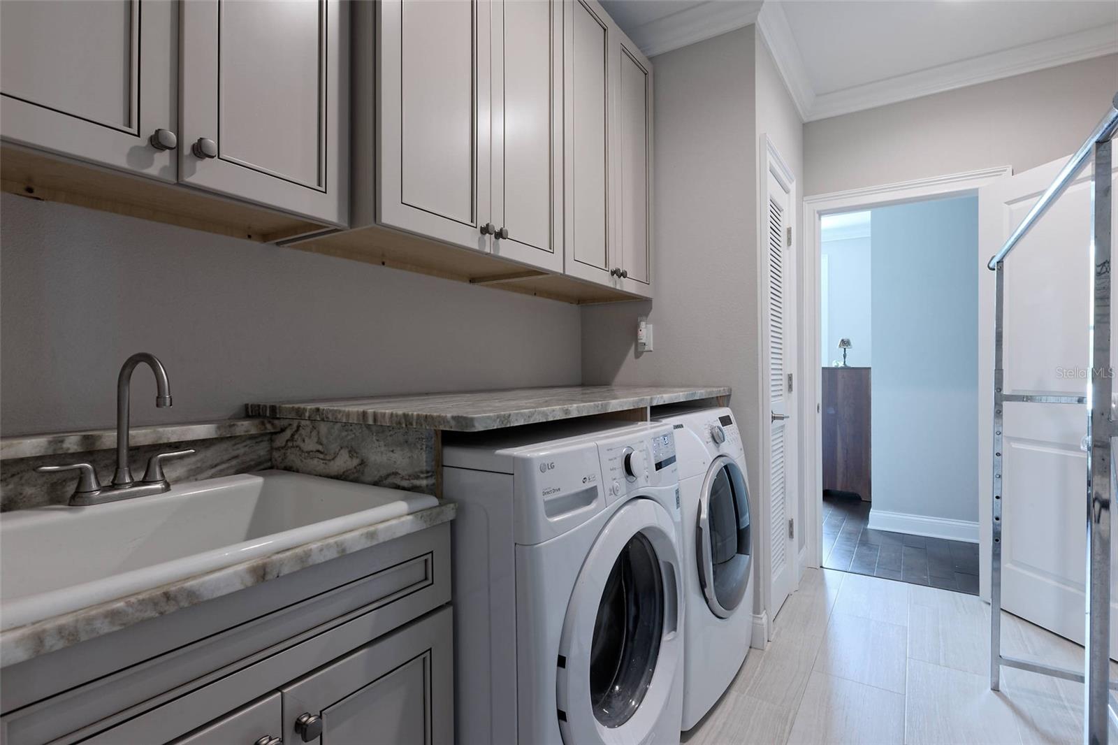 LAUNDRY ROOM ON THE 2ND FLOOR CONNECTED TO BOTH HALLWAYS