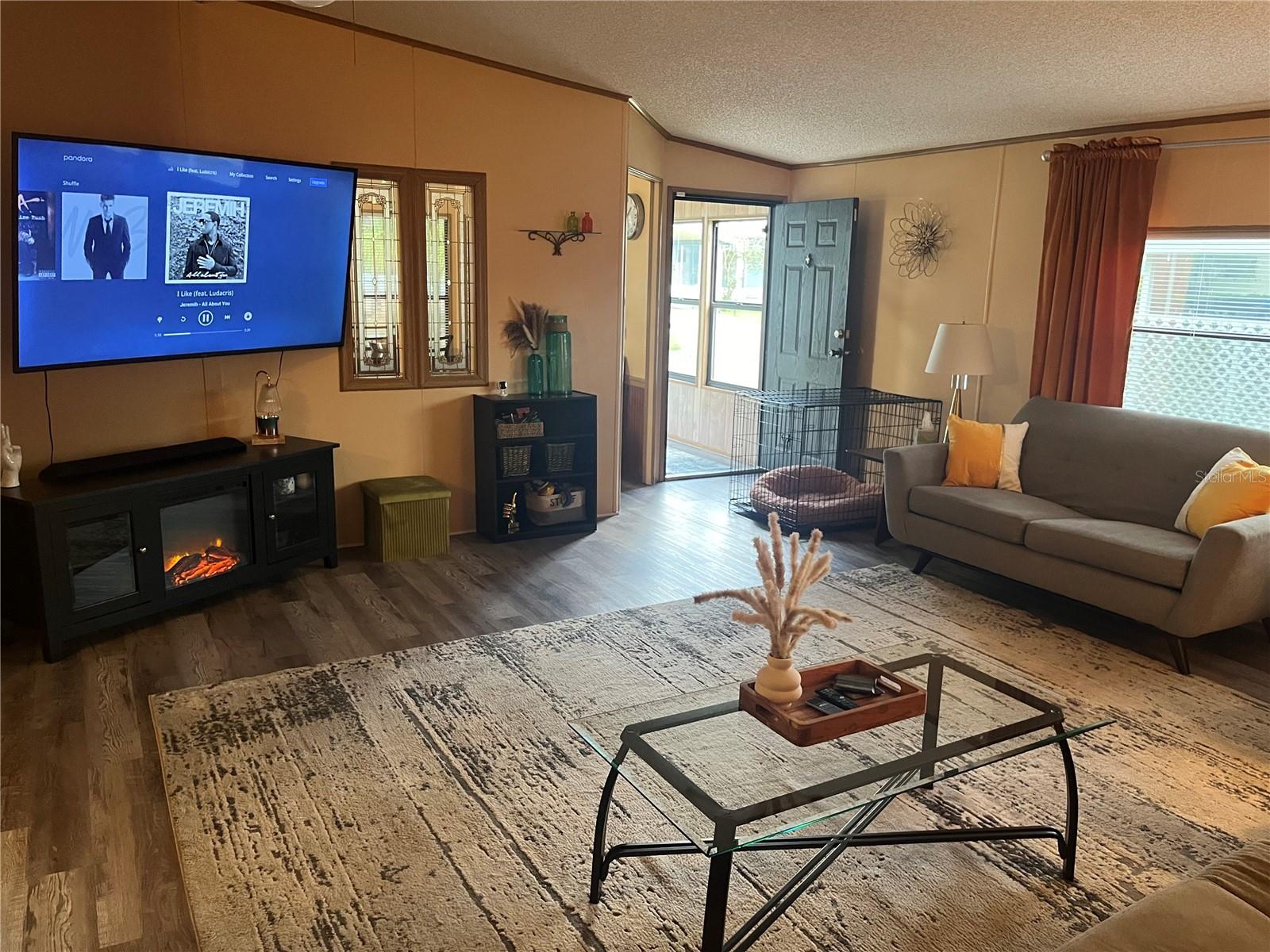 Large living room with laminate flooring