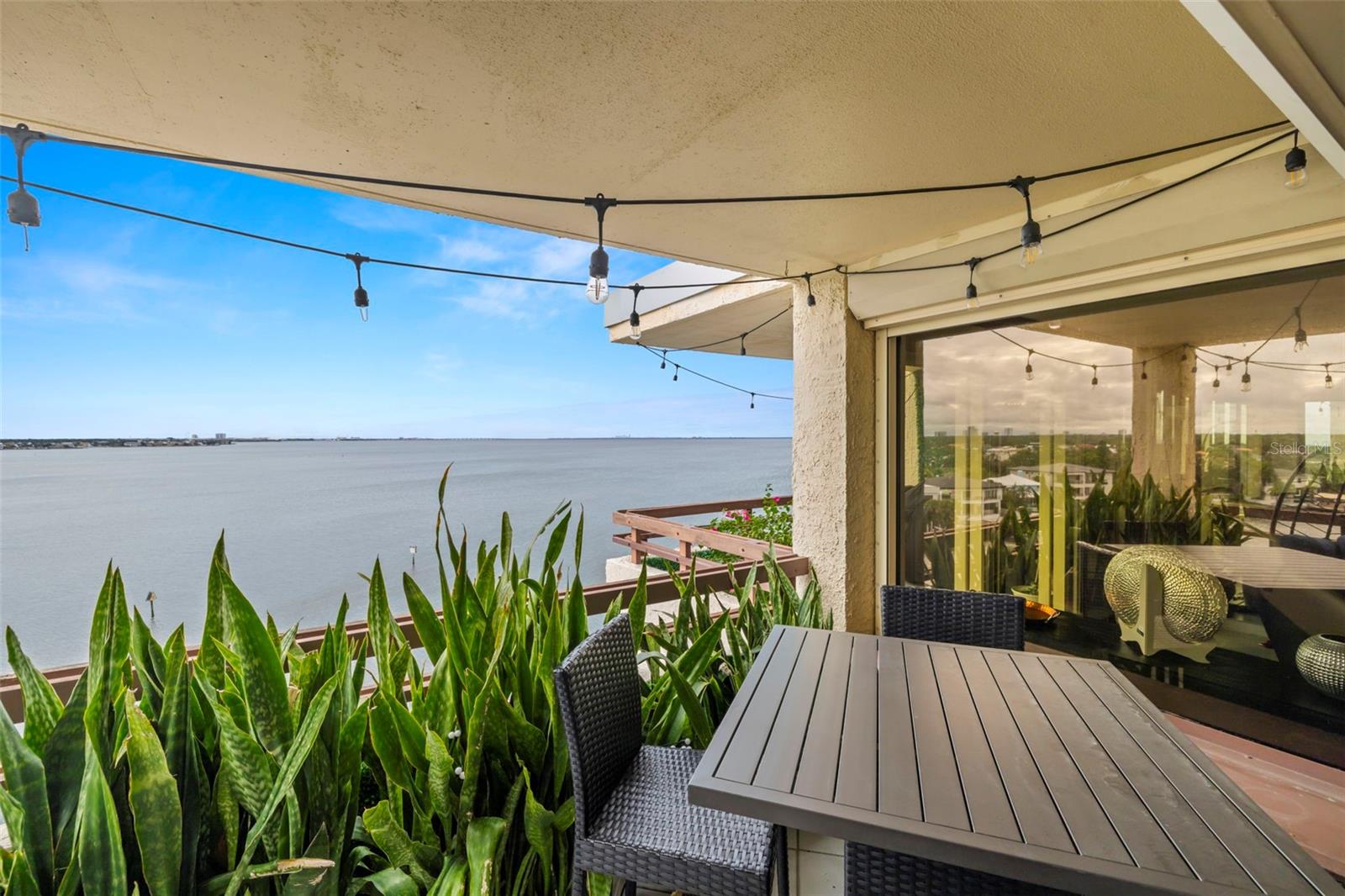 BALCONY SLIDER DOORS TO TILED BALCONY