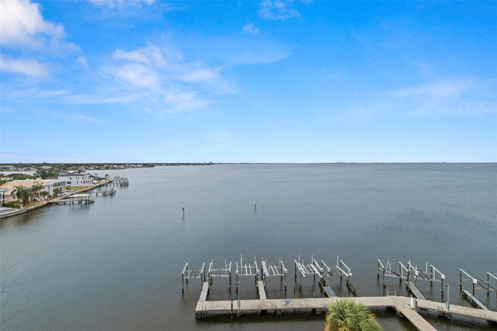 BOAT DOCK WITH ASSIGNED BOAT SLIP WITH LIFT