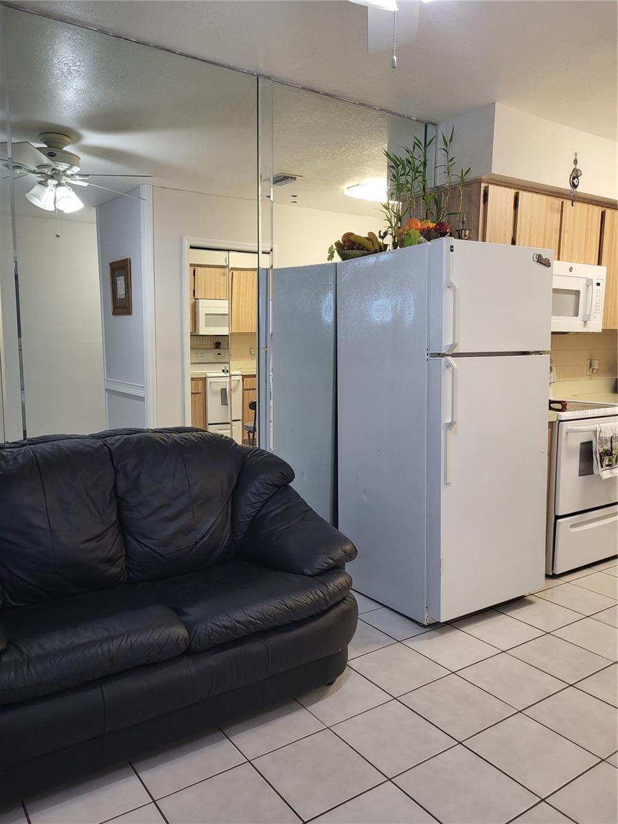 LIVING/ KITCHEN AREA