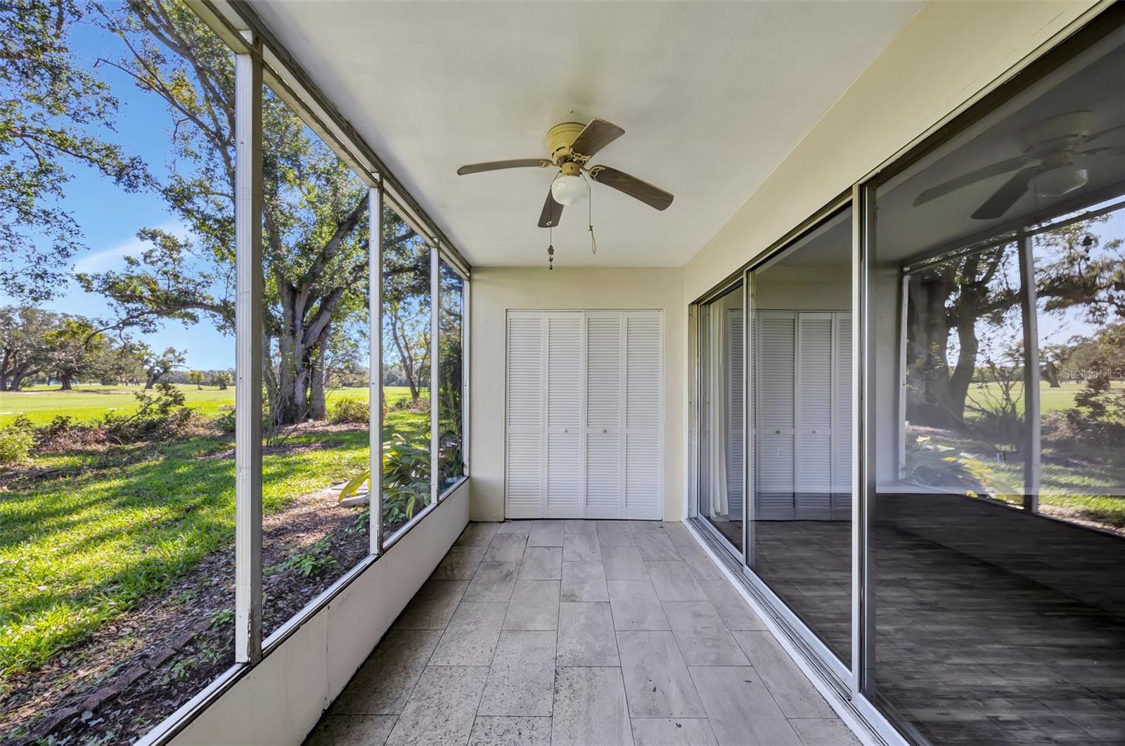 Outside patio area with closet with washer/dryer and water heater