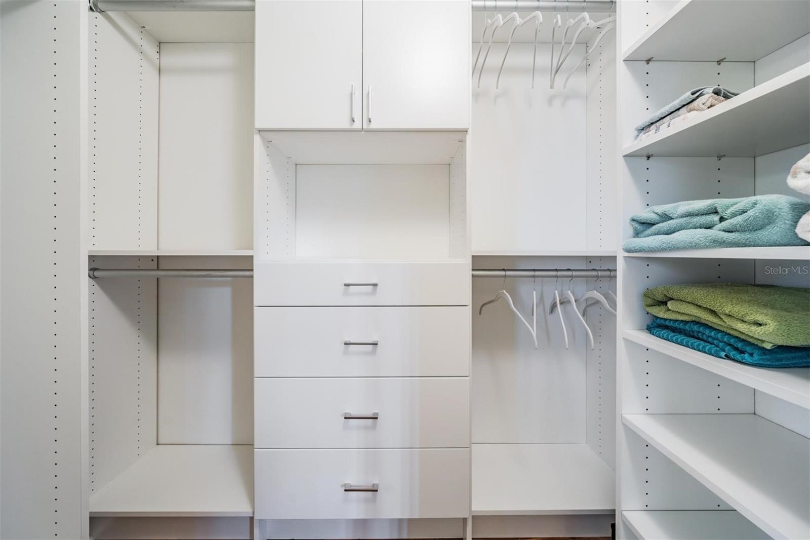 Extensive built-ins in walk-in closet