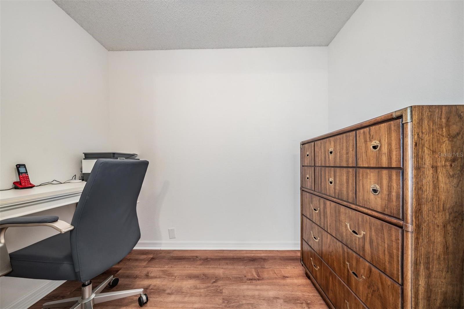 Bedroom 2 flex-area is being used as a home office - make this room your own!