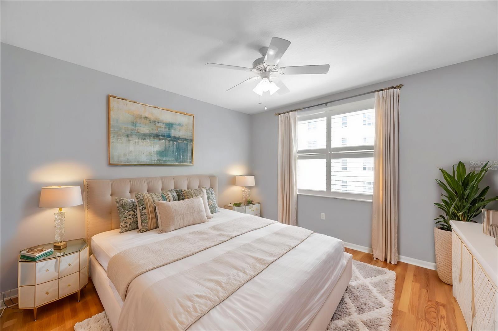 Virtually staged guest bedroom.